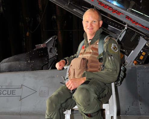 Brig. Gen. Chris Weggeman,boards an F-16 Fighting Falcon before his final flight