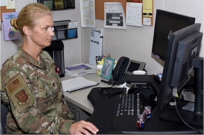 U.S. Air Force Officer Maj. Kimberly McKenna, 633rd Medical Group Family Advocacy officer, poses for a photo at the Langley Mental Health Clinic, Joint Base Langley-Eustis, Virginia, June 11, 2021. McKenna is a Board Certified Diplomate in Clinical Social Work, Bachelor of Science in Social Work. (U.S. Air Force photo by 1st. Lt. Paige Skinner)