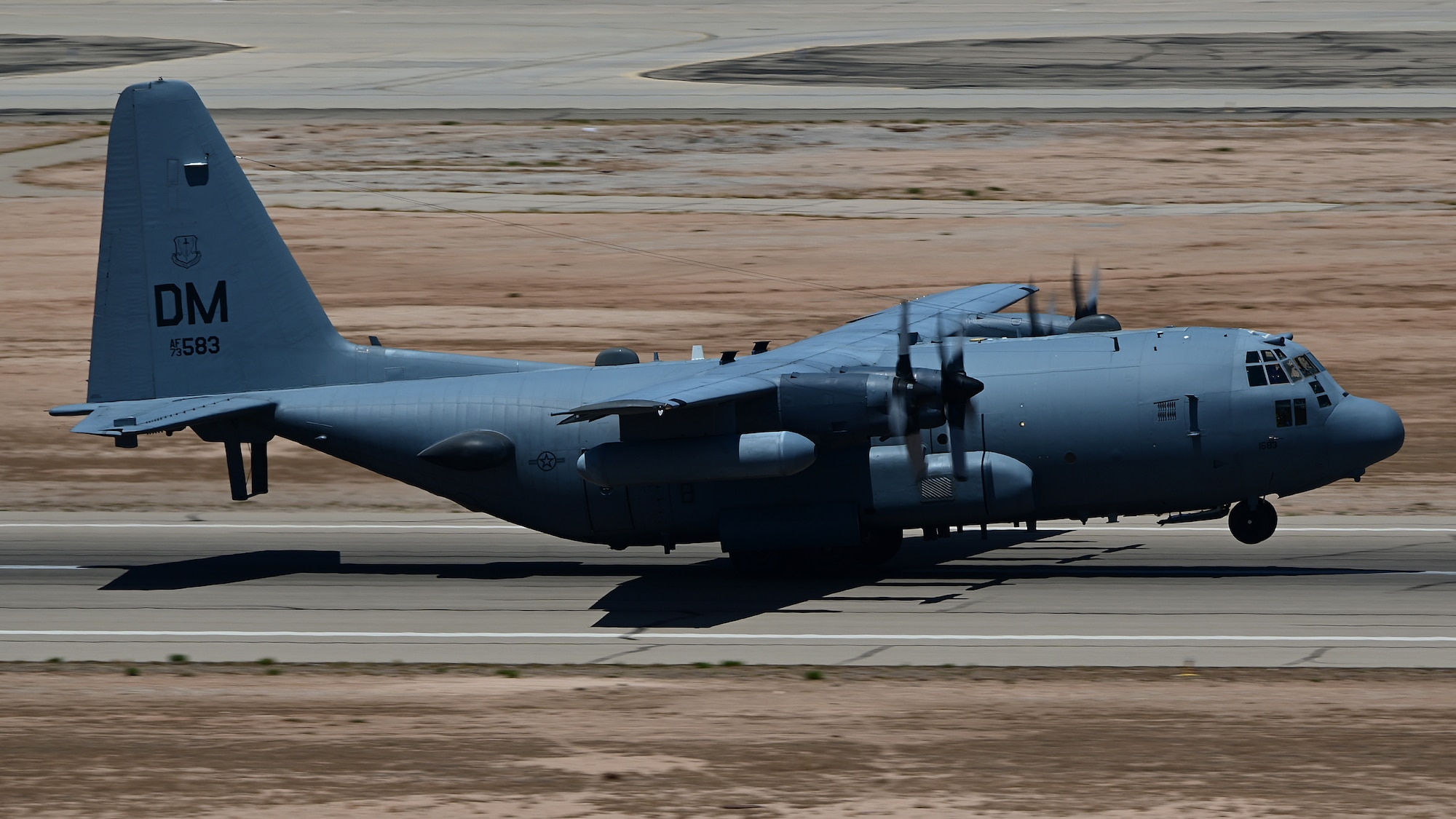 A photo of an aircraft taking off from the flight line