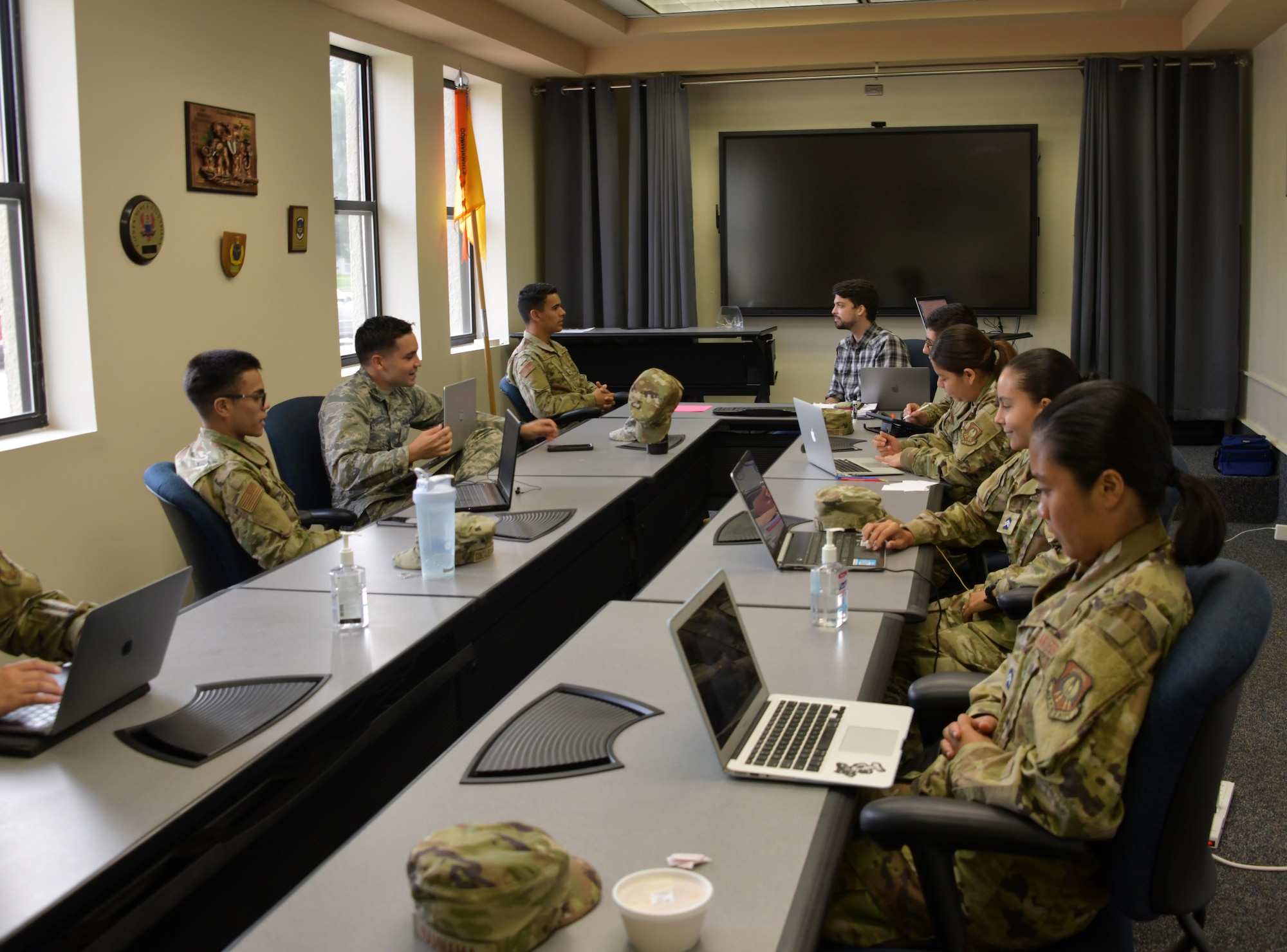 Cadets, participants of  the Puerto Rico Project Language program, engage with their instructor at Maxwell Air Force Base, Alabama, June 25, 2021. The four week program hosted a total 45 cadets, providing them with necessary skills to pass the Air Force Officer’s Qualification Test, such as, verbal skills and confidence needed to communicate during live training events. (U.S. Air Force photo by Senior Airman Rhonda Smith)