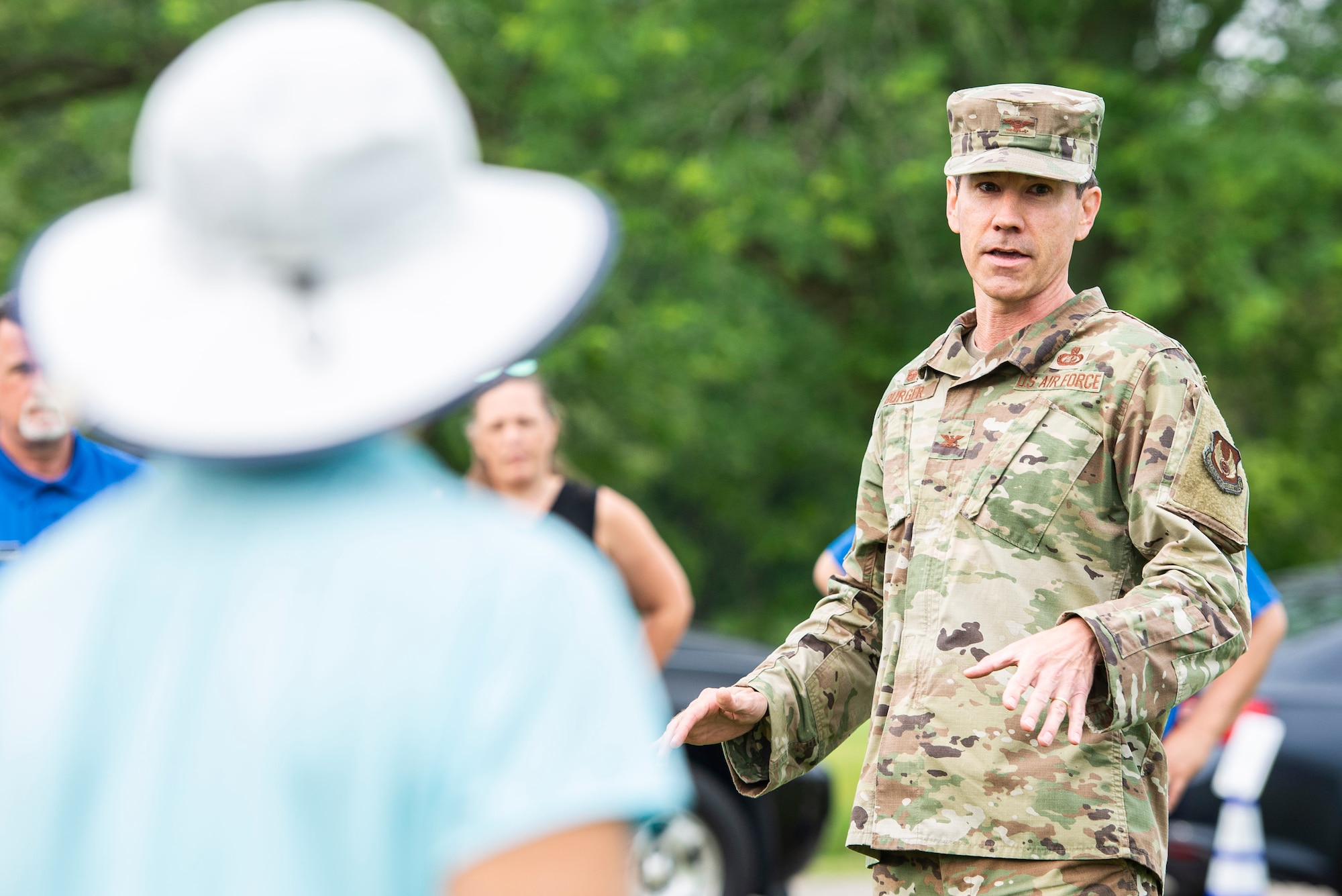 U.S. Air Force Col. Paul Burger, 88th Mission Support Group commander, provides remarks prior to cutting the ribbon of newly designed holes 7 and 8 of the Prairie Trace golf course, June 25, 2021, at Wright-Patterson Air Force Base, Ohio. The cutting marks the completion of the first phase of a multi-mission dollar program which required the previous holes to be moved to make room for the expansion of the National Air and Space Intelligence Center. (U.S. Air Force photo by Wesley Farnsworth)