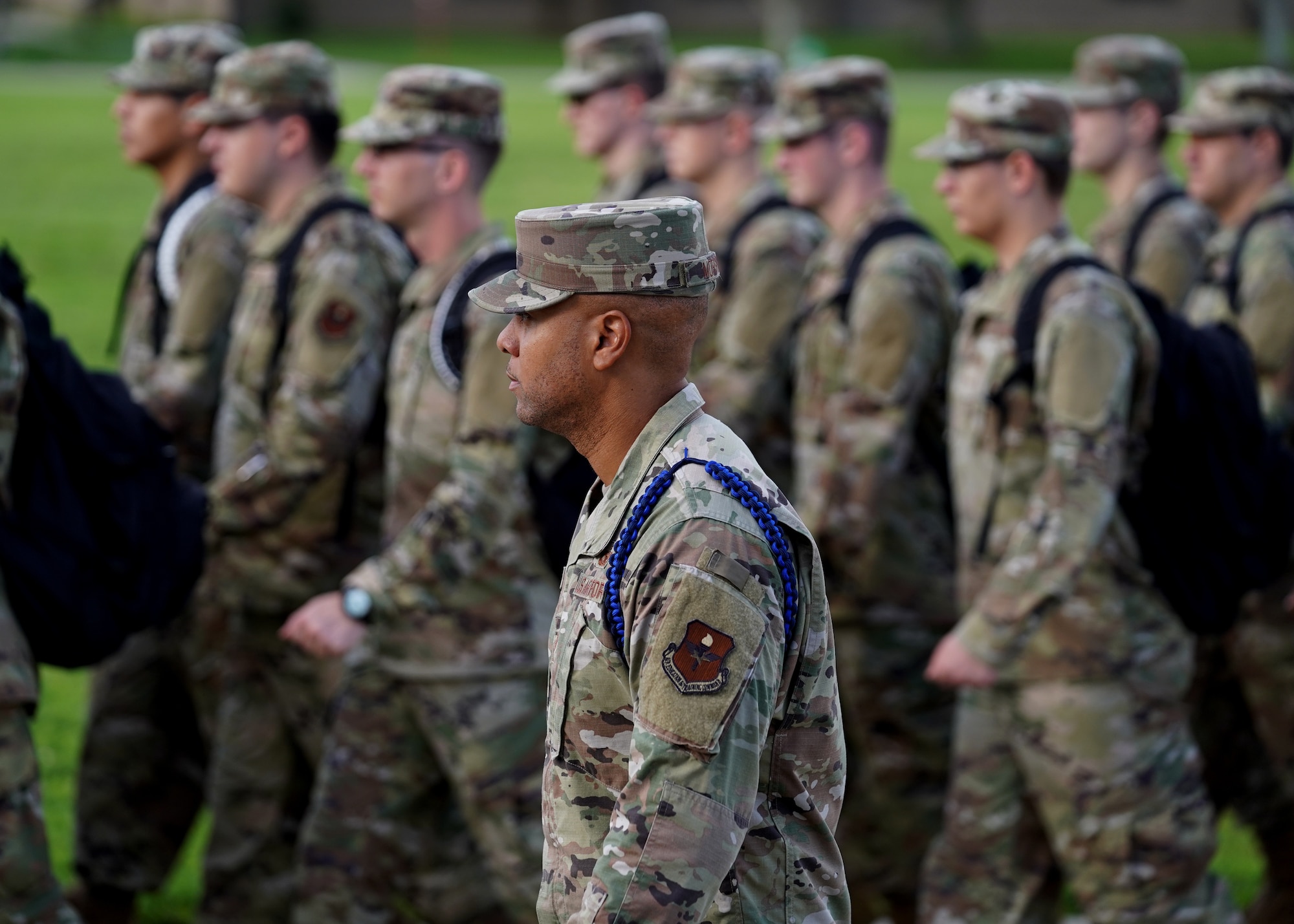 U.S. Air Force Tech. Sgt. Alvin Morris, 336th Training Squadron master military training leader, marches Airmen in training to school on Keesler Air Force Base, Mississippi, June 29, 2021. “I’ve been empowered with the tools to mold Airmen to be successful and to also challenge them to grow,” said Morris. “Understanding this pivotal role and short amount of time that I have to impact each Airman keeps me ready to mentor, train and lead at all times. Developing our Airmen, watching them grow into leaders is very fulfilling for my position.” (U.S. Air Force photo by Senior Airman Spencer Tobler)