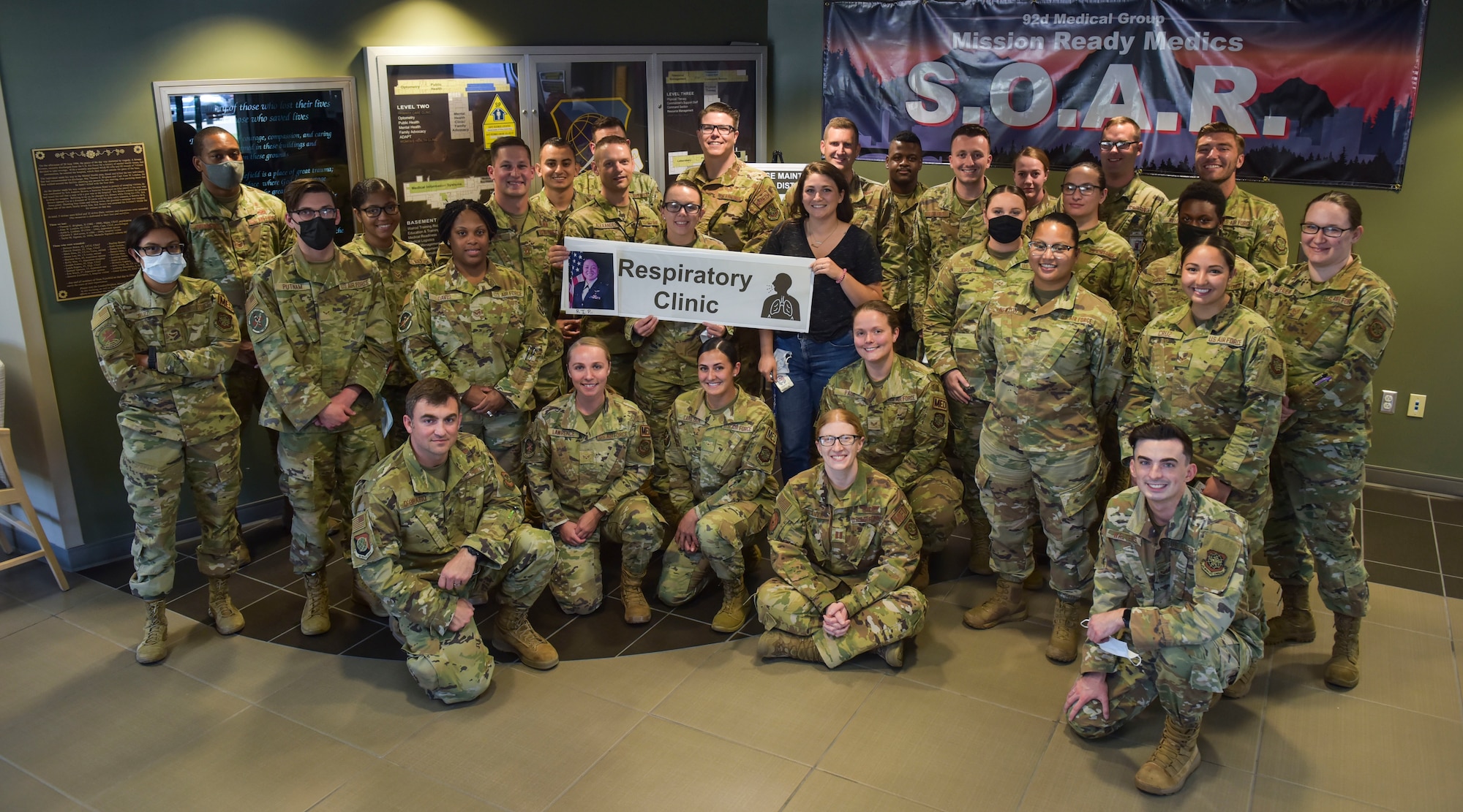 Respiratory clinic personnel gather for a photo the day before closing at the 92nd Medical Group on Fairchild Air Force Base, Washington, June 30, 2021.