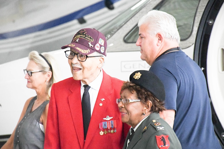 Tuskegee Airman retired Brig. Gen. Charles E. McGee and retired U.S. Army Col. Cloe Degraffenreid deplane at the Atlantic terminal at Charles B. Wheeler Downtown Airport.