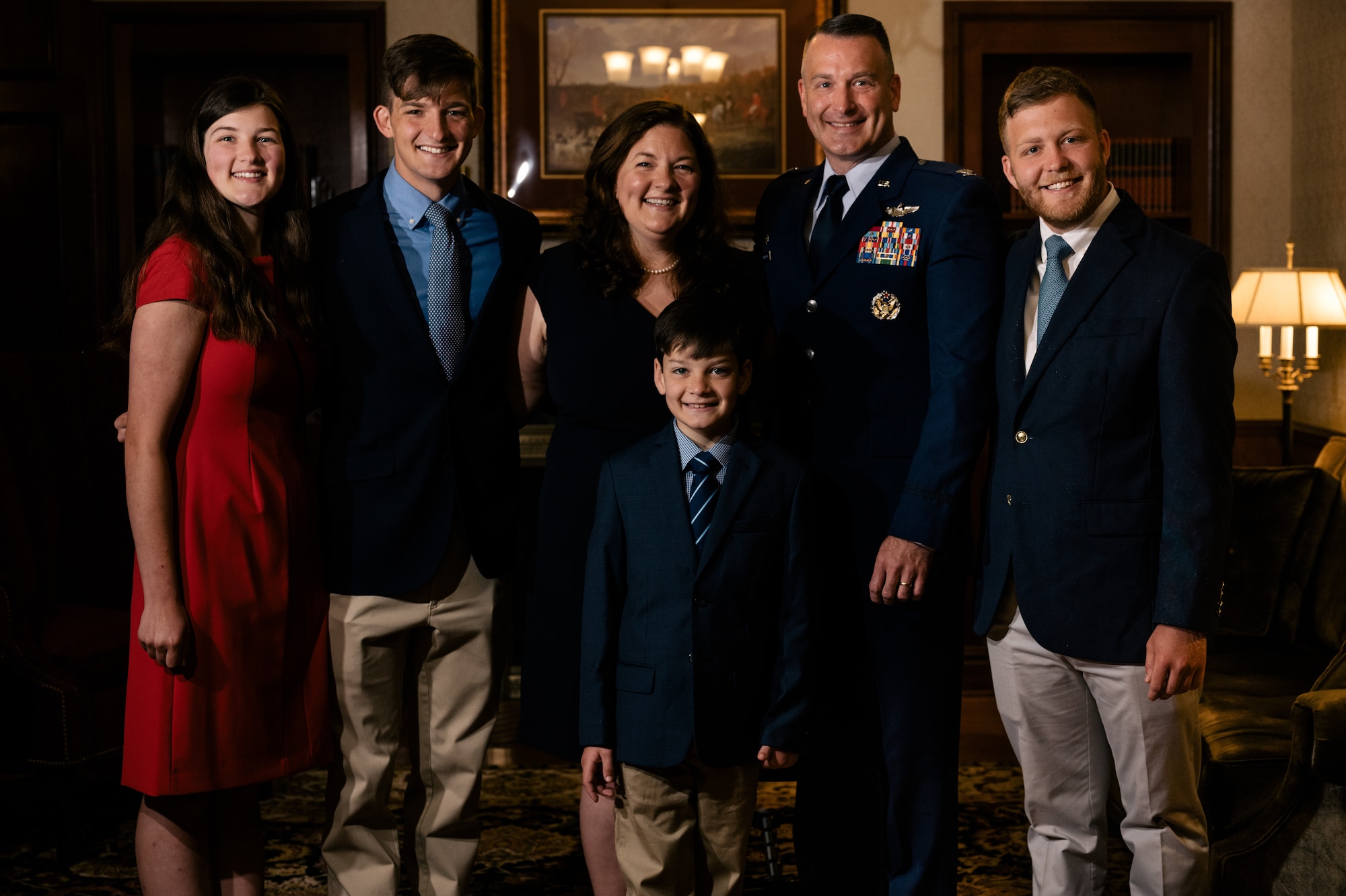 Col. Chris Robinson, 375th Air Mobility Wing commander, has a family portrait taken with his wife Stephanie and their children, Wyatt, Matthew, Kate and George at the Essex House on Scott Air Force Base, Illinois, July 1, 2021. Robinson has previously served as the 437th Airlift Wing vice-commander and as aide-de-camp to the Chief of Staff of the Air Force. (U.S. Air Force photo by Tech. Sgt. Jordan Castelan)