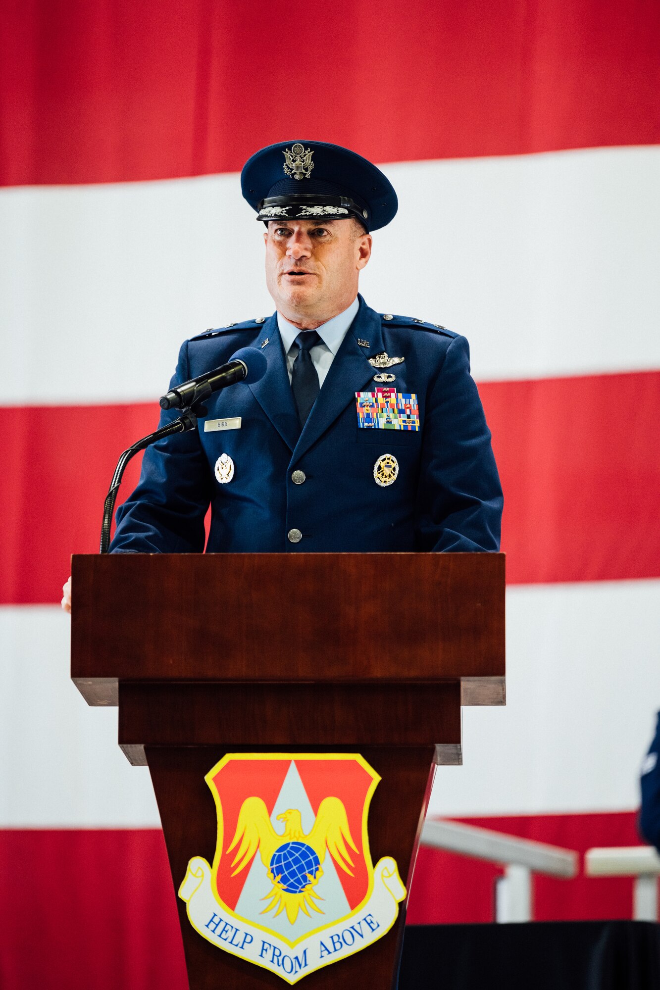 Maj. Gen. Thad Bibb, Jr., 18th Air Force commander, addresses the crowd in attendance for the 375th Air Mobility Wing change of command ceremony on Scott Air Force Base, Illinois, July 1, 2021. The change of command ceremony represents a time-honored military tradition providing an opportunity for Airmen to witness the transfer of power to their newly appointed commanding officer. (U.S. Air Force photo by Tech. Sgt. Jordan Castelan)