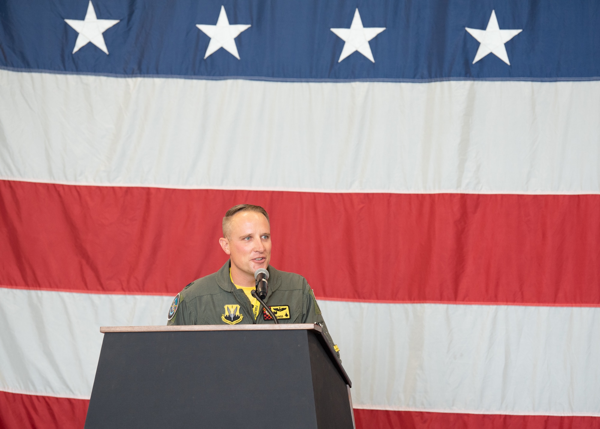 Lt. Col. Greg Farrell gives a speech after taking command of the 4th Fighter Squadron, at Hill Air Force Base, Utah, on July 1, 2021. Farrell previously served as the director of operations for the 421st Fighter Squadron. The 4th FS, the “Fighting Fuujins,” is one of three fighter squadrons that make up the 388th Operations Group, the other two squadrons are the 34th FS, the “Rude Rams,” and the 421st FS, the “Black Widows.” (U.S. Air Force photo by Staff Sergeant Thomas Barley)