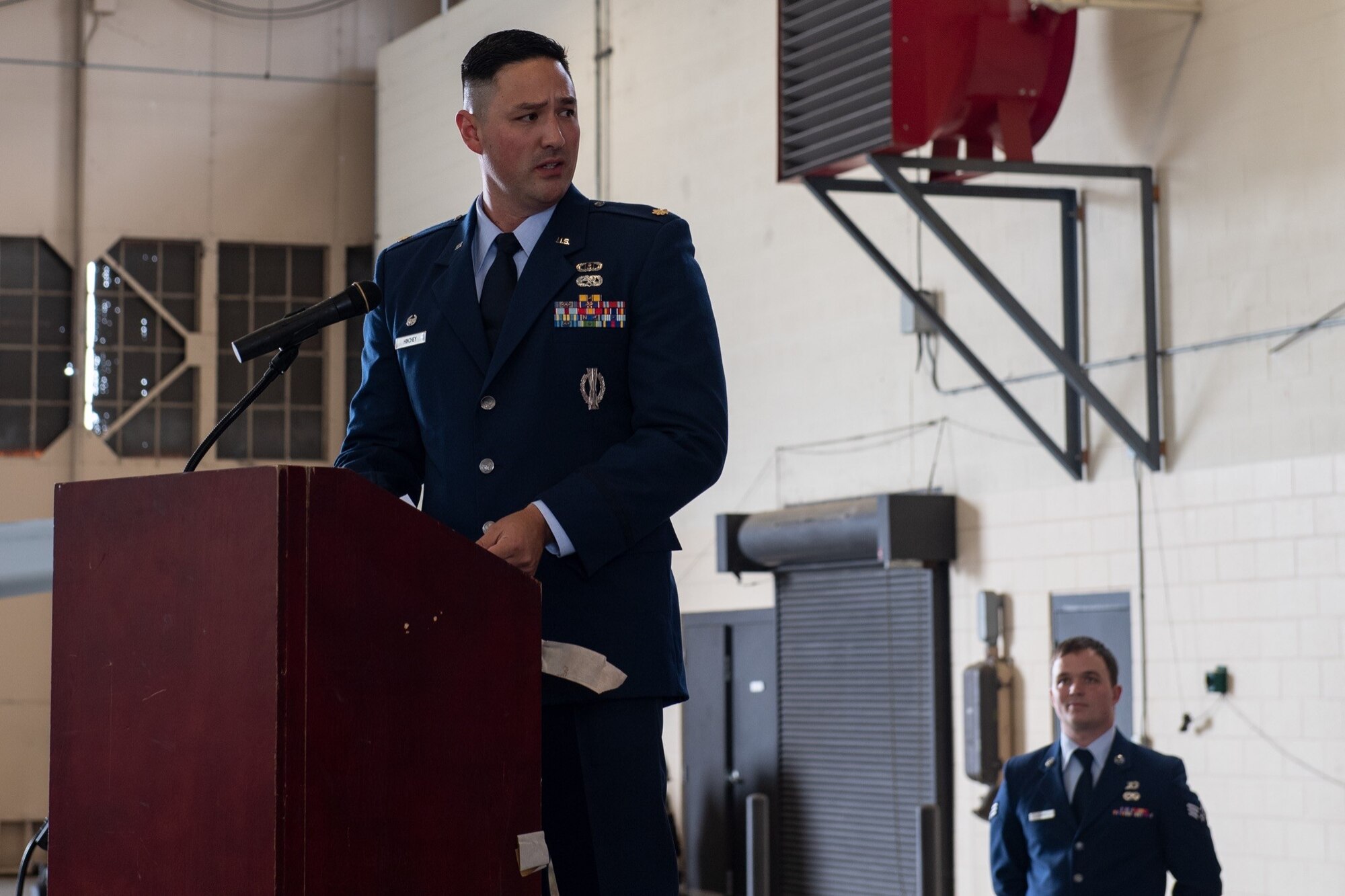 U.S. Air Force Maj. William Hichney, 23d Munitions Squadron commander, delivers a speech during the assumption of command ceremony for the newly reactivated squadron, July 1, 2021, at Moody Air Force Base, Georgia. The 23d MUNS will be directly assisting with the management of a $58 million munitions mission set for the 23d Wing. (U.S. Air Force photo by Senior Airman John Crampton)