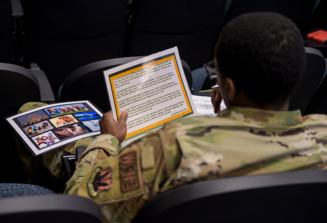 man looking at flash card