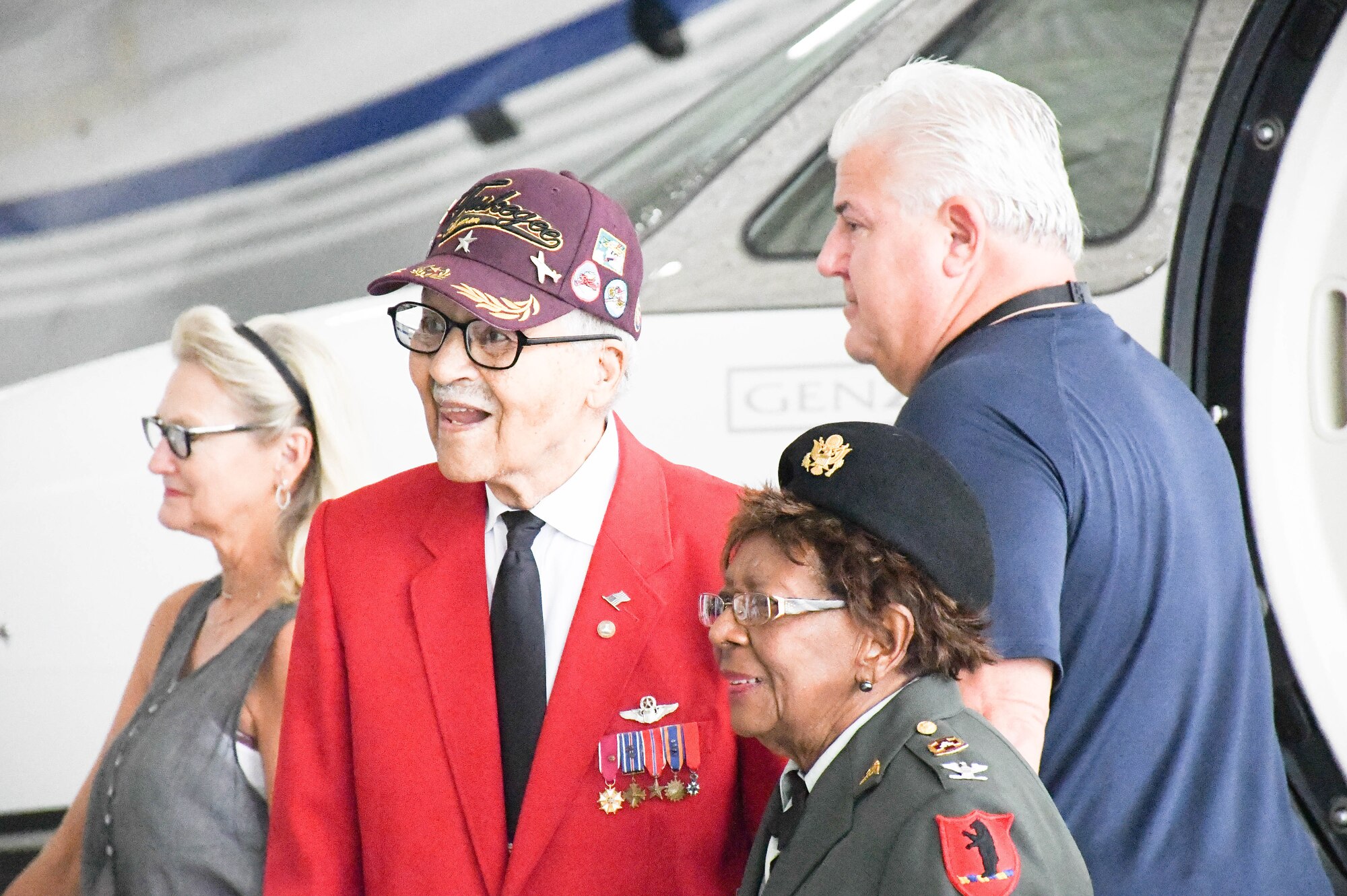 Tuskegee Airman retired Brig. Gen. Charles E. McGee and retired U.S. Army Col. Cloe Degraffenreid deplane at the Atlantic terminal at Charles B. Wheeler Downtown Airport.
