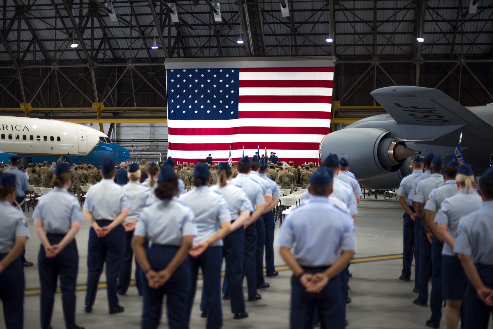 Airmen from the 375th Air Mobility Wing attend a change of command ceremony on Scott Air Force Base, Illinois, July 1, 2021. The change of command ceremony represents a time-honored military tradition providing an opportunity for Airmen to witness the transfer of power to their newly appointed commanding officer.  (U.S. Air Force photo by Airman 1st Class Mark Sulaica)