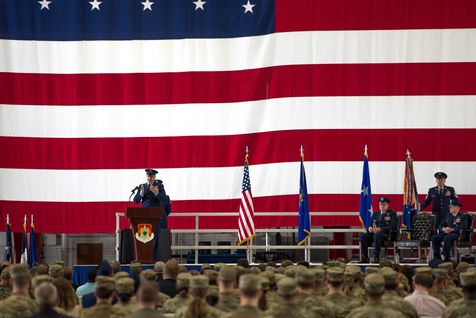 U.S. Air Force Col. Chris Robinson, 375th Air Mobility Wing commander, gives a speech on Scott Air Force Base, Illinois, July 1, 2021. The change of command ceremony represents a time-honored military tradition providing an opportunity for Airmen to witness the transfer of power to their newly appointed commanding officer. (U.S. Air Force photo by Airman 1st Class Mark Sulaica)