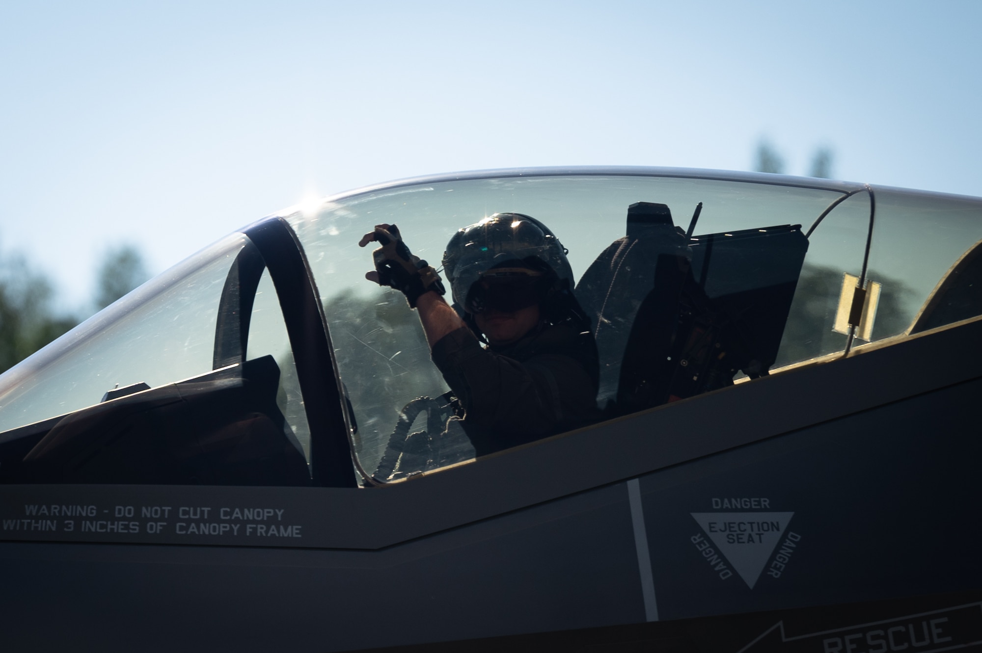 U.S. Air Force Lt. Col. Samuel Chipman, the 355th Fighter Squadron (FS) commander, renders the squadron salute prior to takeoff on Eielson Air Force Base, Alaska, July 1, 2021.