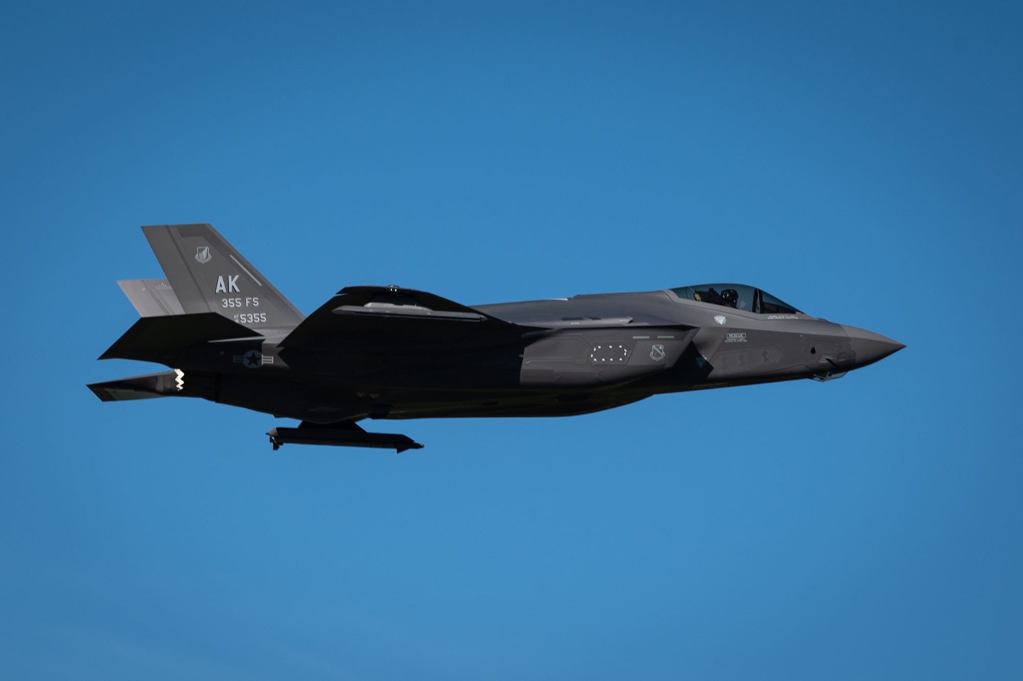 An F-35A Lightning II assigned to the 355th Fighter Squadron flies over Eielson Air Force Base, Alaska, July 1, 2021.
