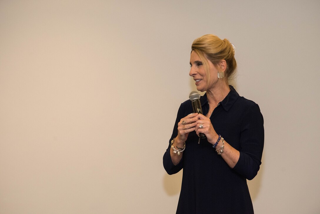 Cindy Wilsbach, First Lady of Pacific Air Forces (PACAF) and PACAF Spouses Club President, speaks during a PACAF Squadron Commander Course and Spouses Orientation, Joint Base Pearl Harbor-Hickam, Hawaii, June 21, 2021. The course was attended by squadron commanders preparing to take command within PACAF and their spouses. Spouses were invited to attend in order to receive insight and mentorship for the challenges they may face alongside their partners.  (U.S. Air Force photo by Staff Sgt. Hailey Haux)