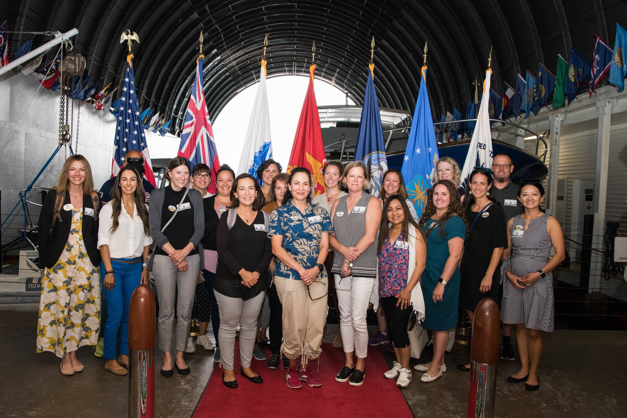 Participants of the 2021 Pacific Air Forces Squadron Commander Course pose for a photo before a barge tour of the Arizona Memorial at Pearl Harbor, Hawaii, June 24, 2021. The course enabled military spouses to discuss opportunities to solve challenges throughout the Pacific Air Forces’ area of responsibility and how to overcome them with innovative ideas. (U.S. Air Force photo by Staff Sgt. Hailey Haux)