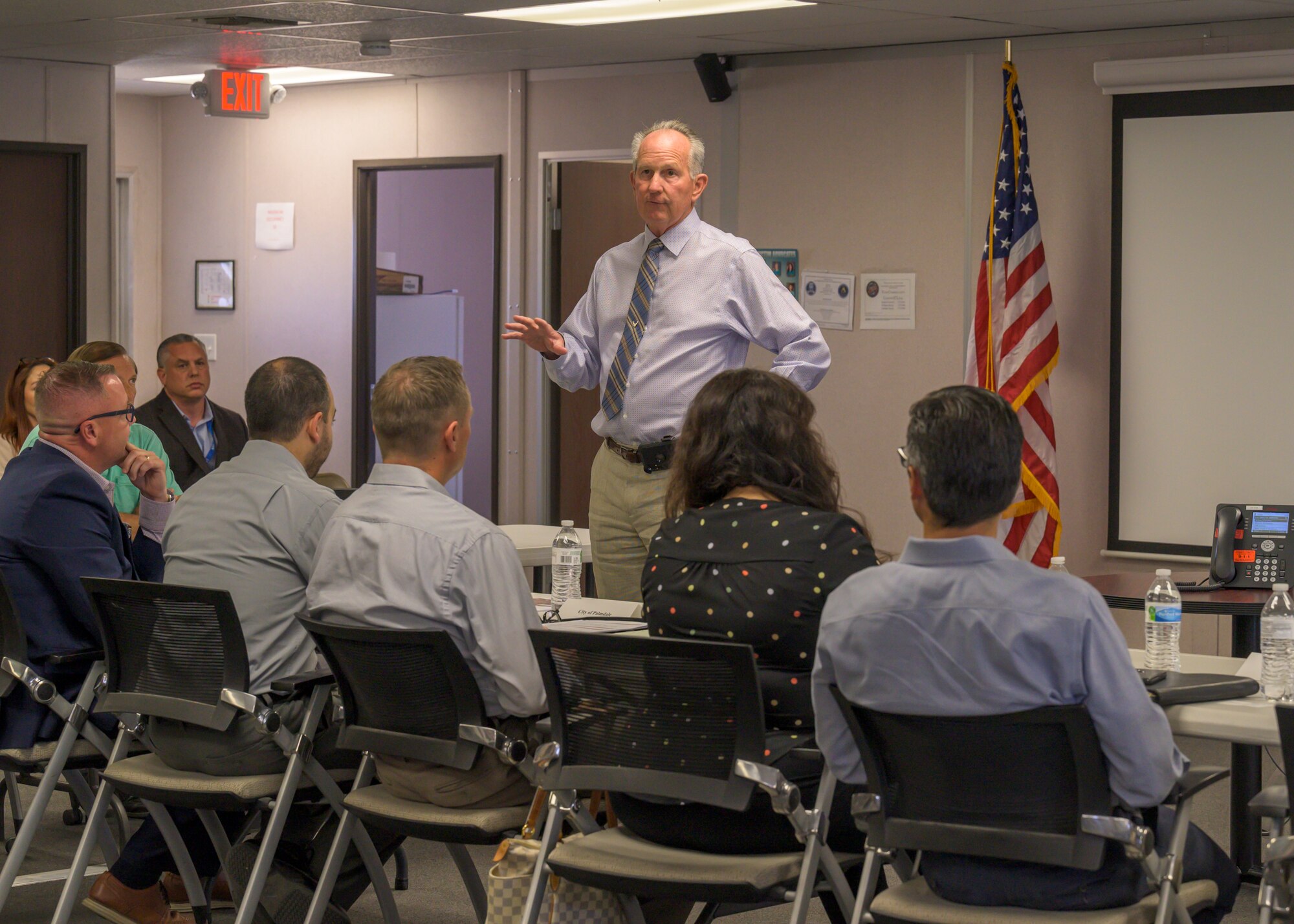 Dr. David Smith, Plant 42 director, provides opening remarks during a meeting between local civic leaders to discuss traffic safety around Plant 42 in Palmdale, California, June 30. (Air Force photo by Giancarlo Casem)