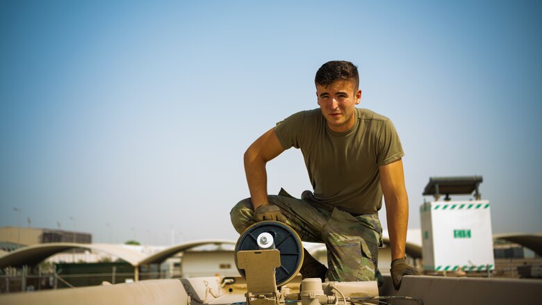 U.S. Air Force Senior Airman Robert Waldbillig, 380th Expeditionary Logistics Readiness Squadron fuels distributor,  fuels aircraft at Al Dhafra Air Base, United Arab Emirates, June 23, 2021.