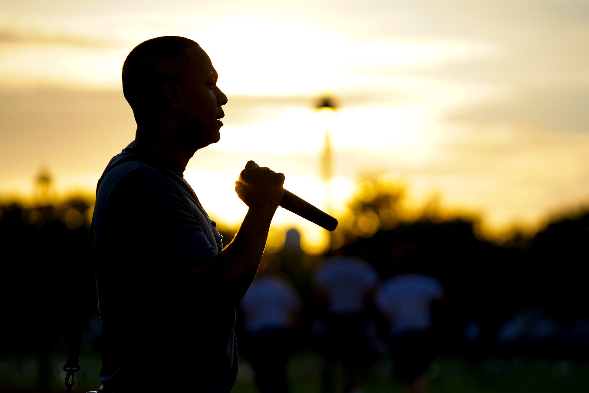 U.S. Air Force Tech. Sgt. Alvin Morris, 336th Training Squadron master military training leader, motivates Airmen in training at the Triangle track on Keesler Air Force Base, Mississippi, June 29, 2021. “An MTL consistently enforces standards of conduct and expectations to develop Airmen to be prepared to enter the operational Air Force,” said Morris. “We are the professional example for Airmen to emulate and first look at what a healthy leadership team looks like. It is our responsibility to inspire Airmen to take pride in serving and exhibit excellence in all we do.” (U.S. Air Force photo by Senior Airman Spencer Tobler)
