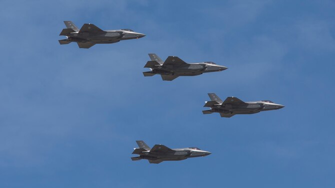 Four F-35 Lightning II jets flying in formation