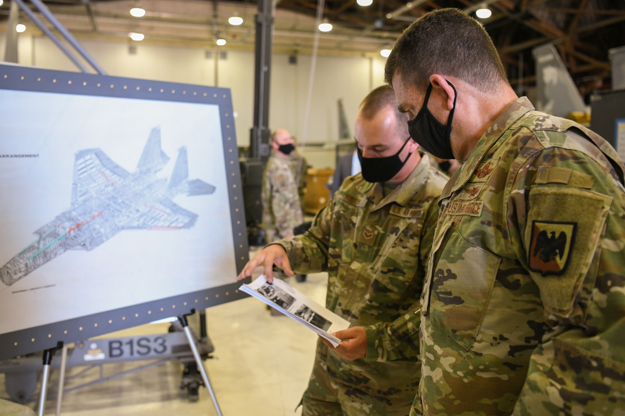 Lt Gen Loh listens to briefing