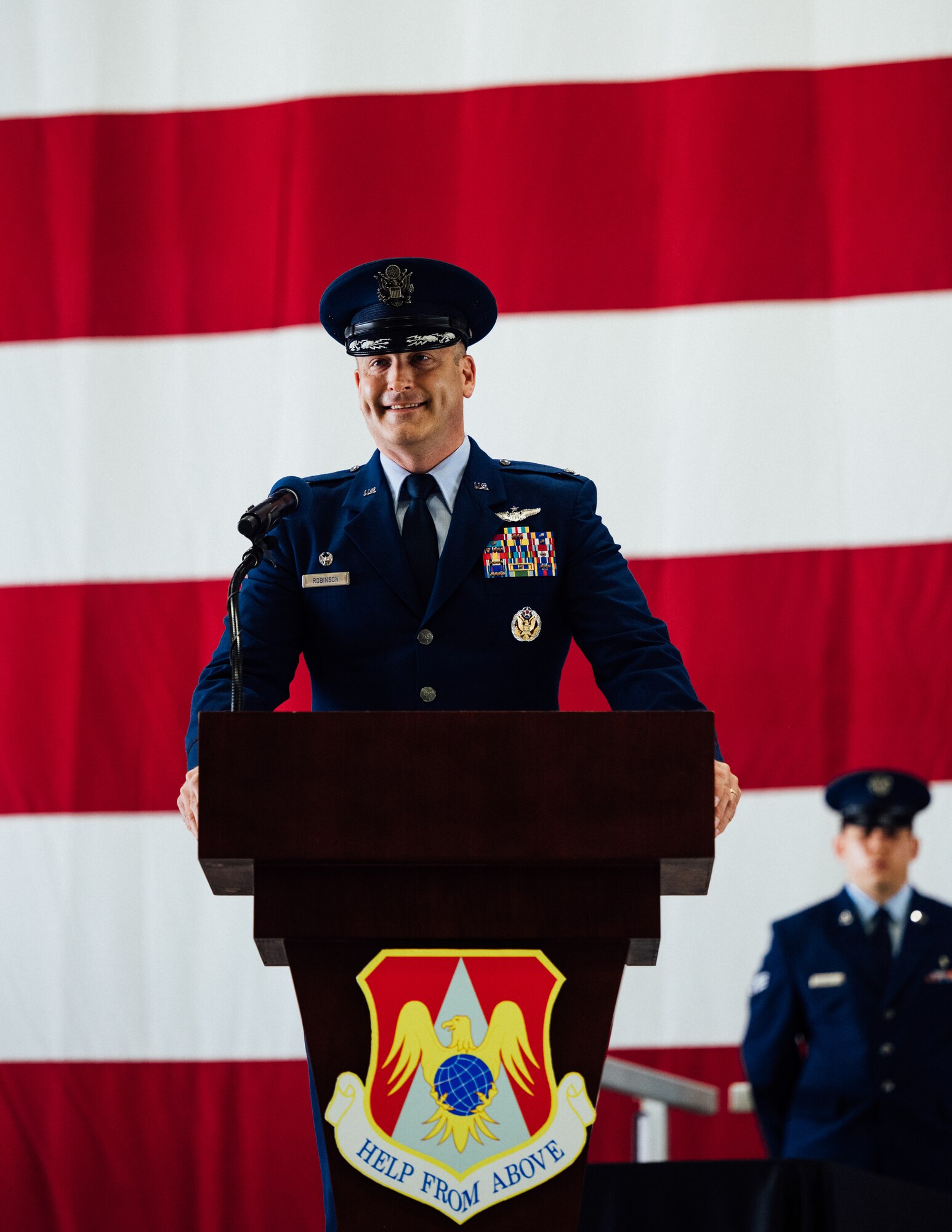 Col. Chris Robinson, 375th Air Mobility Wing commander, addresses the crowd in attendance after assuming command of the 375th AMW on Scott Air Force Base, Illinois, July 1, 2021. Robinson has previously served as the 437th Airlift Wing vice-commander and as aide-de-camp to the Chief of Staff of the Air Force. (U.S. Air Force photo by Tech. Sgt. Jordan Castelan)