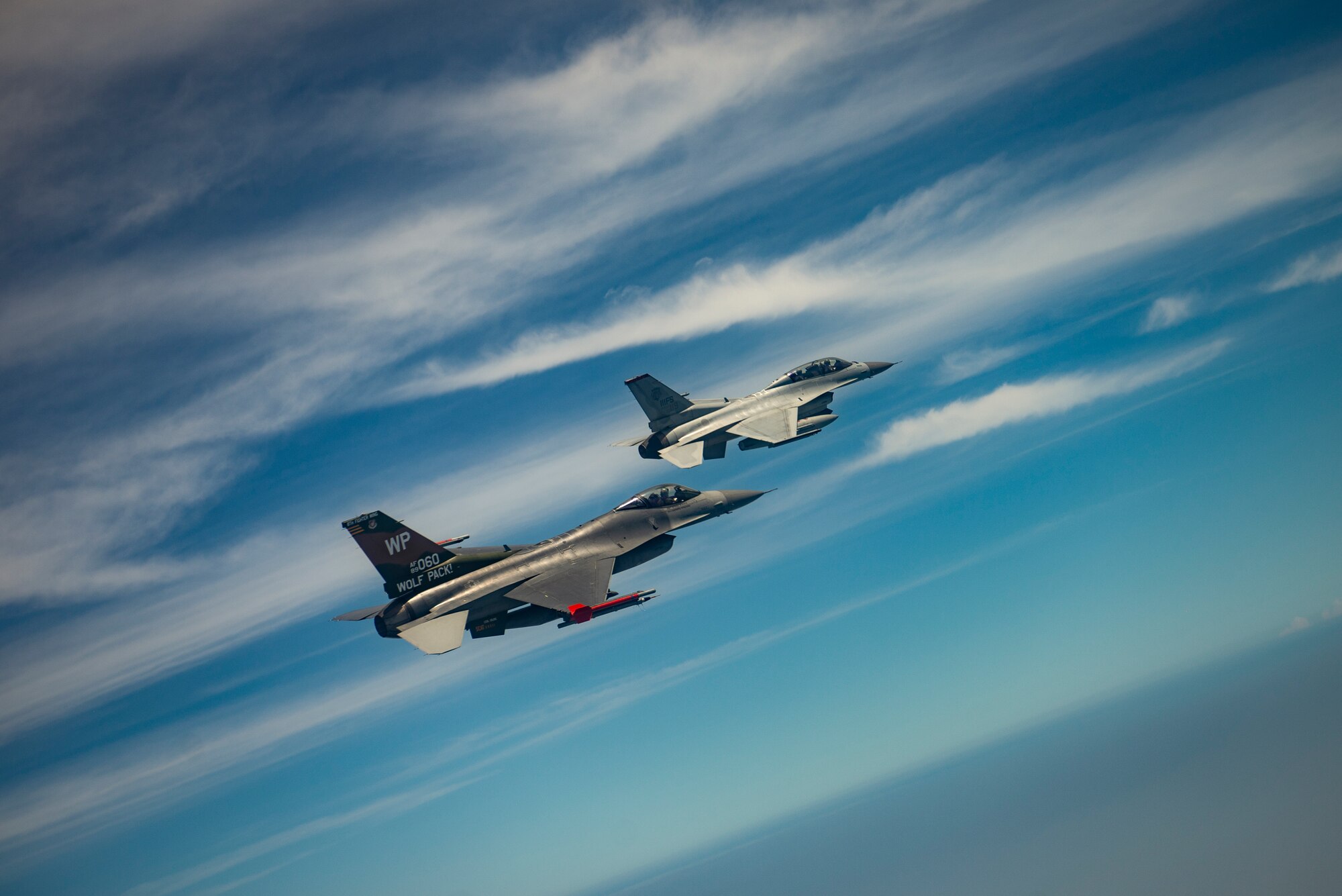 Two jets fly together.