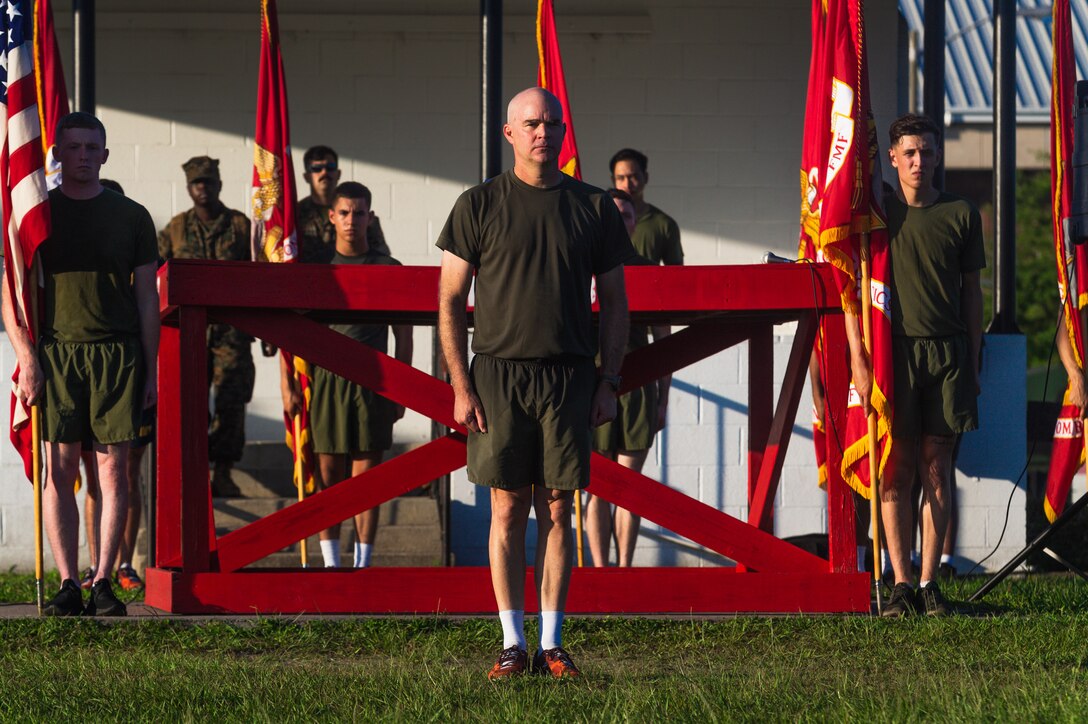 U.S. Marine Corps Brig. Gen. Forrest C. Poole, III, commanding general of 2nd Marine Logistics Group (2nd MLG), speaks with Marines after the group wide 2nd MLG run on Camp Lejeune, North Carolina, July. 1, 2021. The 2nd MLG held the training to boost morale and enhance unit cohesion around the unit (U.S. Marine Corps photo by Lance Cpl. Zachary Zephir)