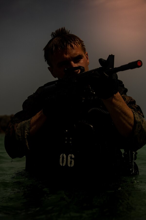 U.S. Marine Corps Cpl. David Ballek, a native of Bemidji, Mass., and a reconnaissance Marine with 2d Reconnaissance Battalion (2d Recon), 2d Marine Division, participates in a night mission during Exercise Caribbean Coastal Warrior on Savaneta Kamp, Aruba, June 27, 2021.