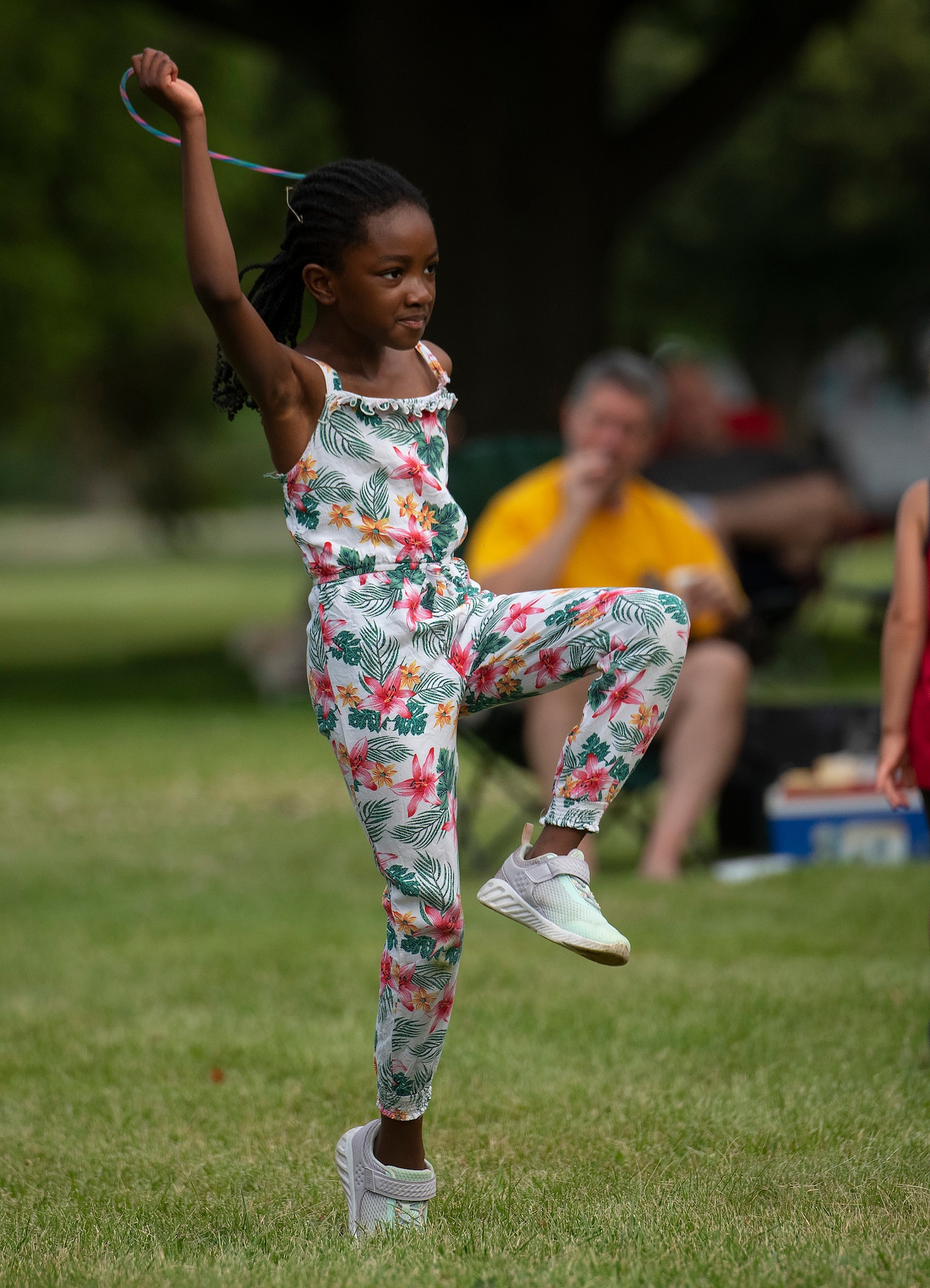 Natalia Jones, 8, the daughter of Maj. Leamon and Vicentia Jones, dances to the music June 24, 2021, at a block party sponsored by the 88th Force Support Squadron in the brick quarters historic district at Wright-Patterson Air Force Base, Ohio. The event featured music, games, food and sponsor booths and gave the Wright-Patt community an opportunity to get out and socialize. (U.S. Air Force photo by R.J. Oriez)
