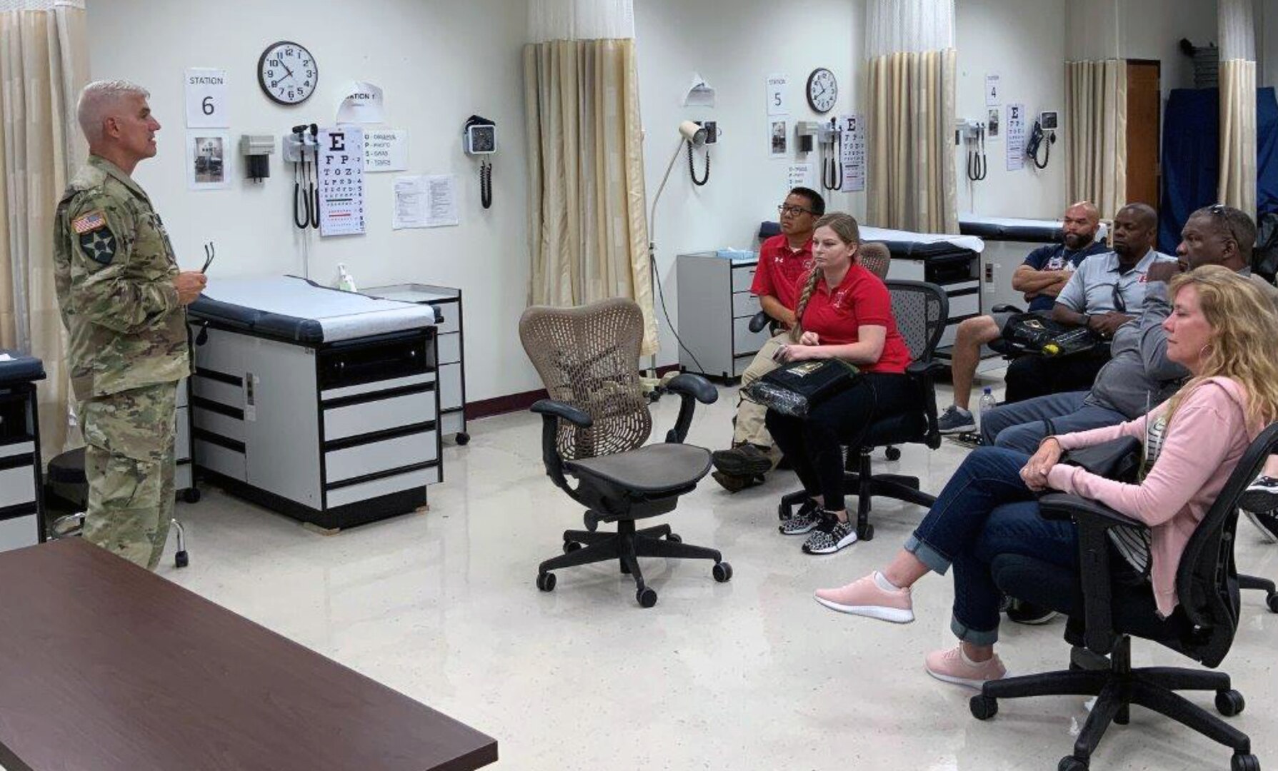 Photo of Col. Larry Lindsay, Senior Service Lead and Branch Chief, Interservice Physician Assistant Program, providing a program overview