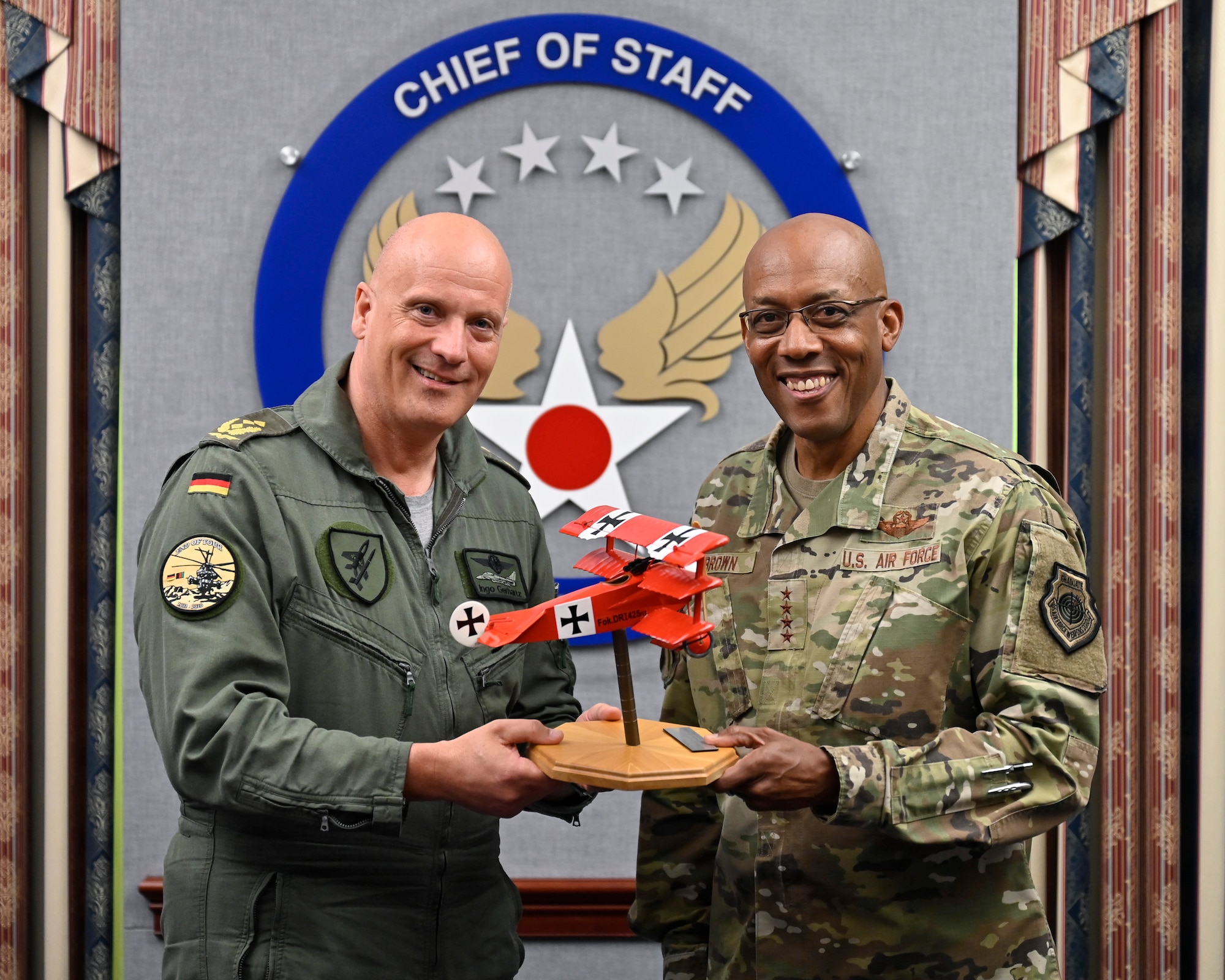 Air Force Chief of Staff Gen. CQ Brown, Jr. poses with Lt. Gen. Ingo Gerhartz, inspector of the German air force, after a meeting