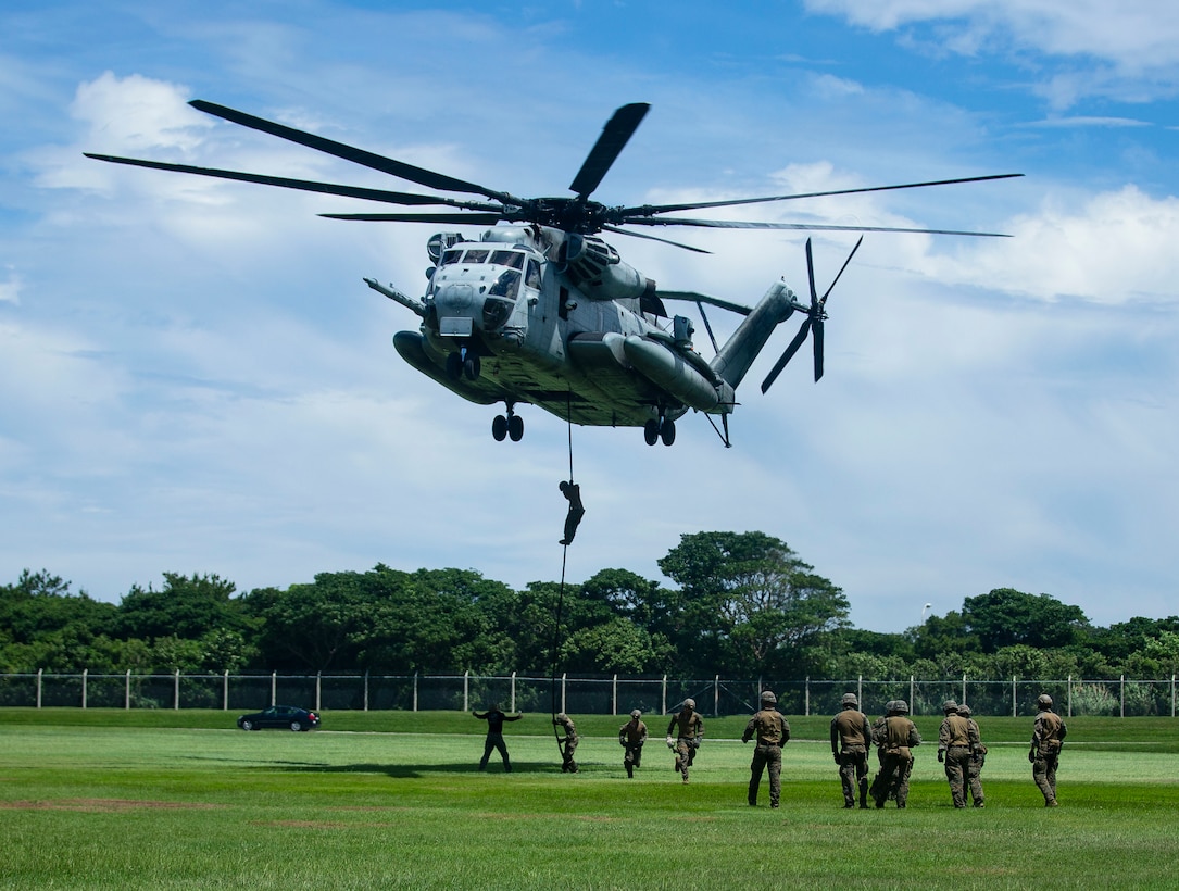U.S. Marines with Maritime Raid Force, 31st Marine Expeditionary Unit, fast rope off a CH-53E Super Stallion, on Camp Hansen, Okinawa, Japan, June 3, 2021. The Marines conduct fast rope training in case they are required to depart from an aircraft in a timely manner or a possible landing in uneven terrain. The 31st MEU, the Marine Corps’ only continuously forward-deployed MEU, provides a flexible and lethal force ready to perform a wide range of military operations as the premier crisis response force in the Indo-Pacific region.