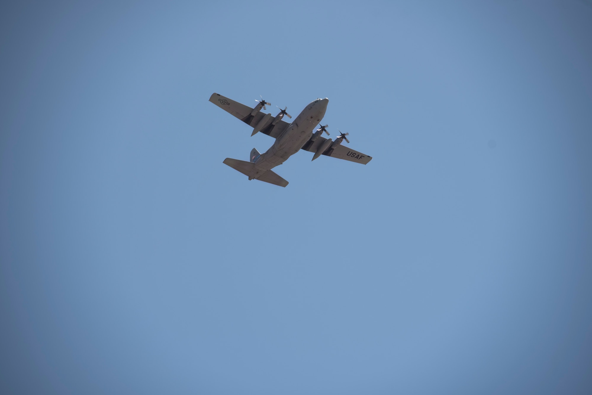 A U.S. Air Force C-130H Hercules, makes a pass during a “fini flight” over Ali Al Salem Air Base, Kuwait, July 4, 2021.