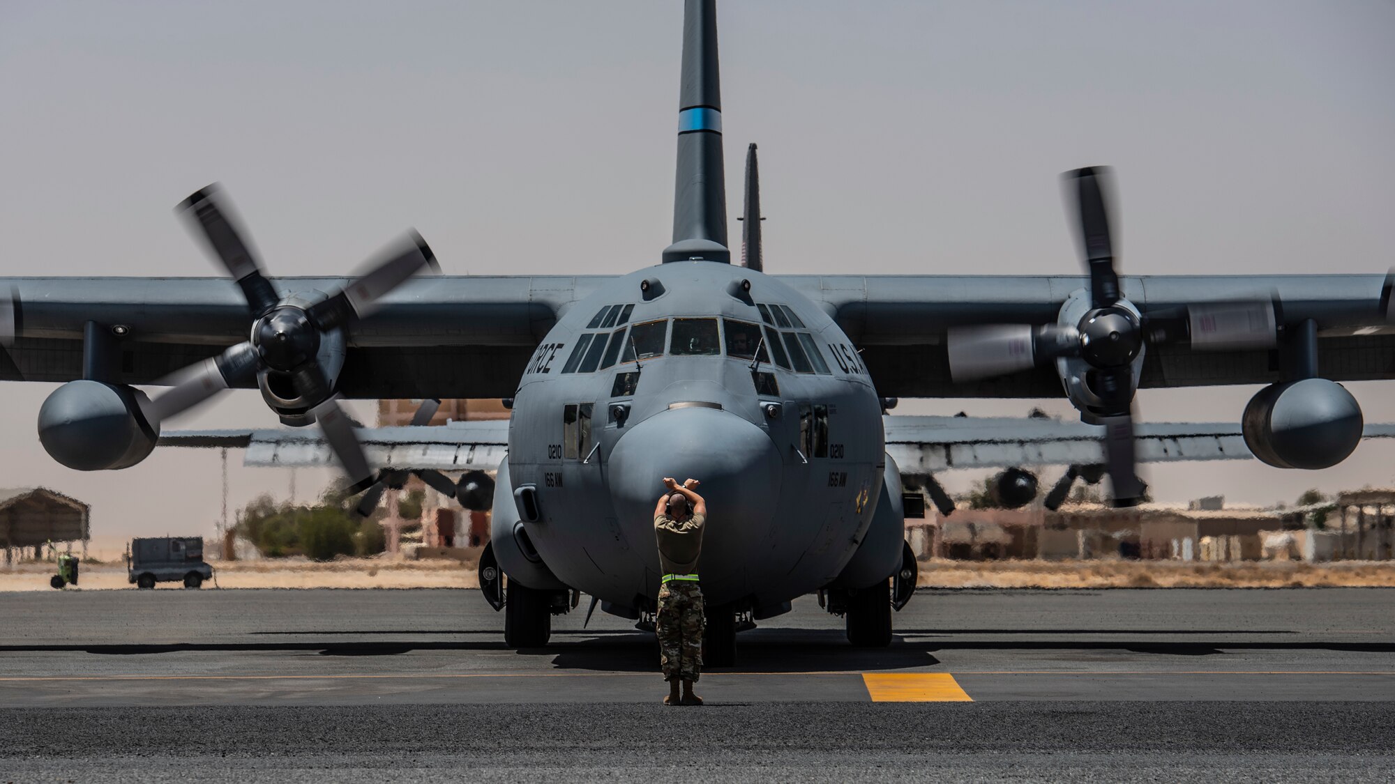 A U.S. Air Force C-130H Hercules, parks on the flight line at Ali Al Salem Air Base, Kuwait, July 4, 2021.