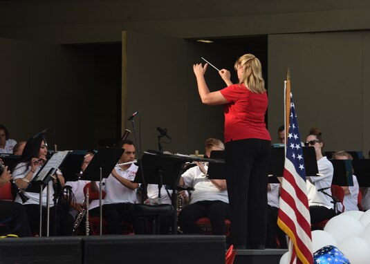 The San Angelo Community Band performs at the Star-Spangled Banner Concert and Fireworks show, at the Bill Aylor Sr. Memorial RiverStage in San Angelo, Texas, July 3, 2021. Local musicians filled the vacancies and performed with the United States Air Force Band of the West at the event. (U.S. Air Force photo by Senior Airman Abbey Rieves)