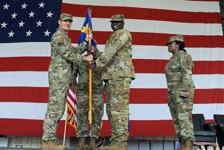 Commanders pose for a photo.