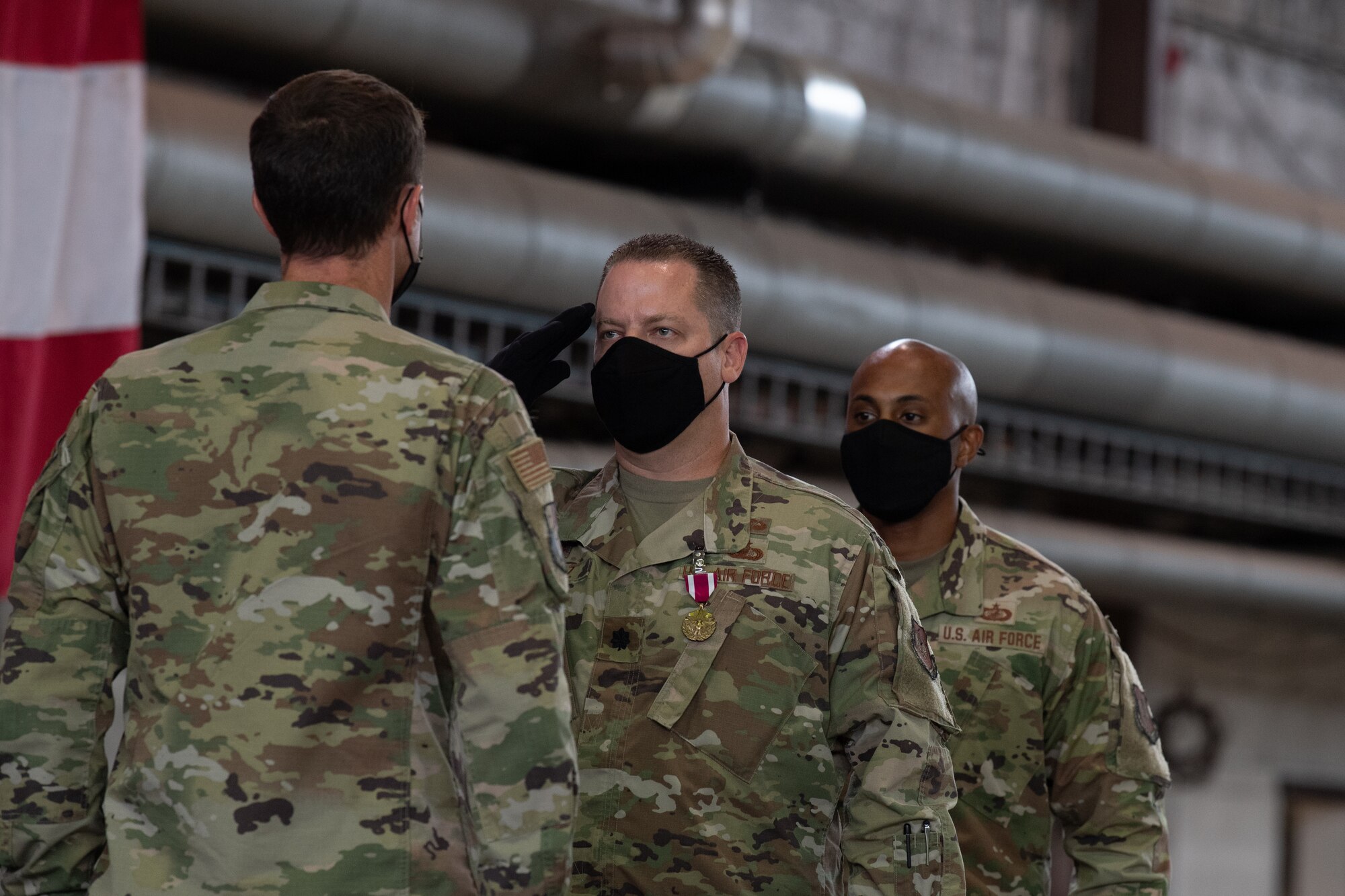 U.S. Air Force Lt. Col. Shawn Schulz, outgoing 52nd Comptroller Squadron commander, renders a salute to the wing commander at the 52nd CPTS change of command ceremony at Spangdahlem Air Base, Germany, June 30, 2021. The commander of the comptroller squadron also is responsible for overseeing the Wing Staff Agencies, which encompasses many flights such as Command Post, Public Affairs and the base legal office. (U.S. Air Force photo by Senior Airman Ali Stewart)