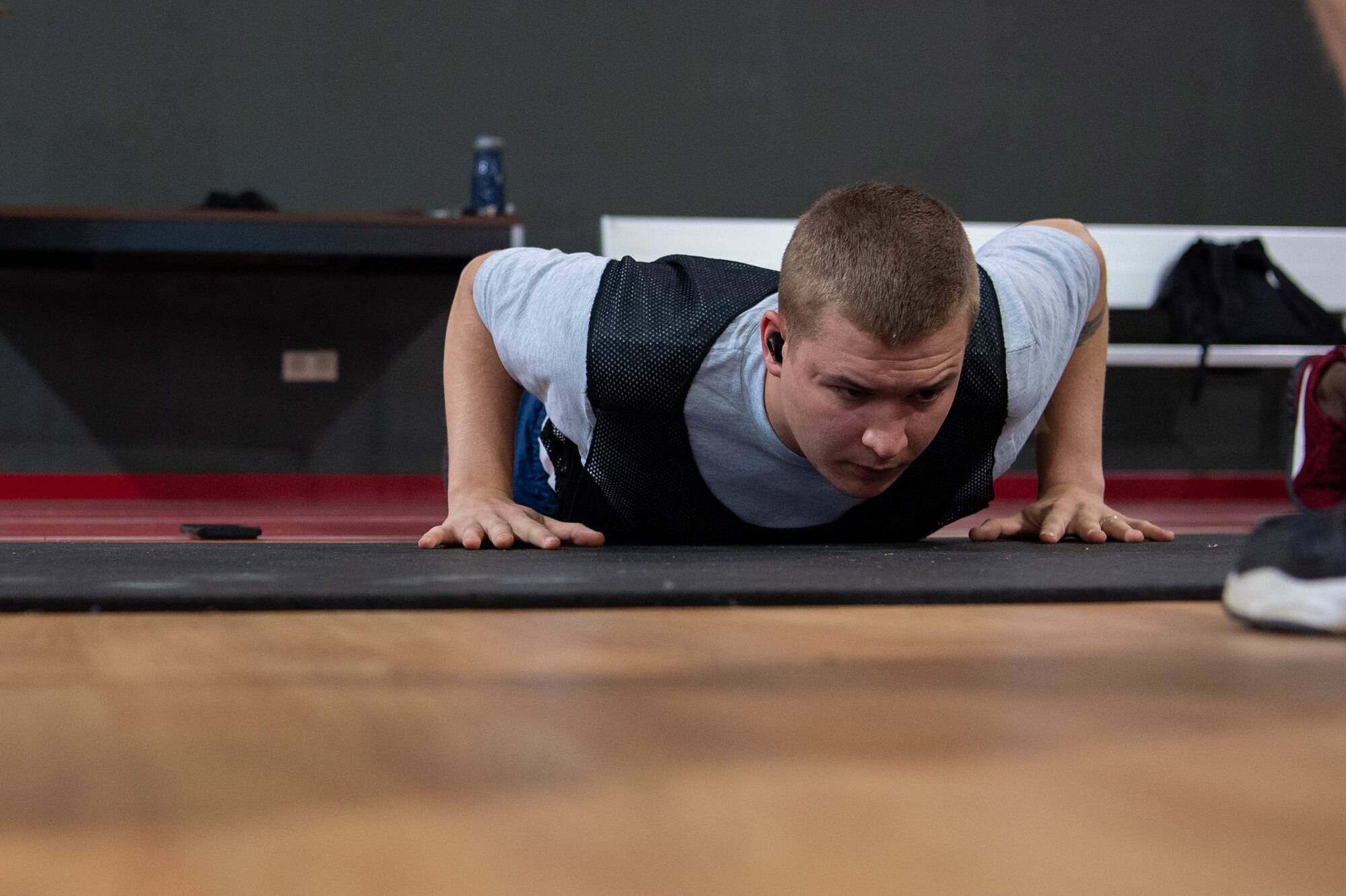 Airman does sit-ups.