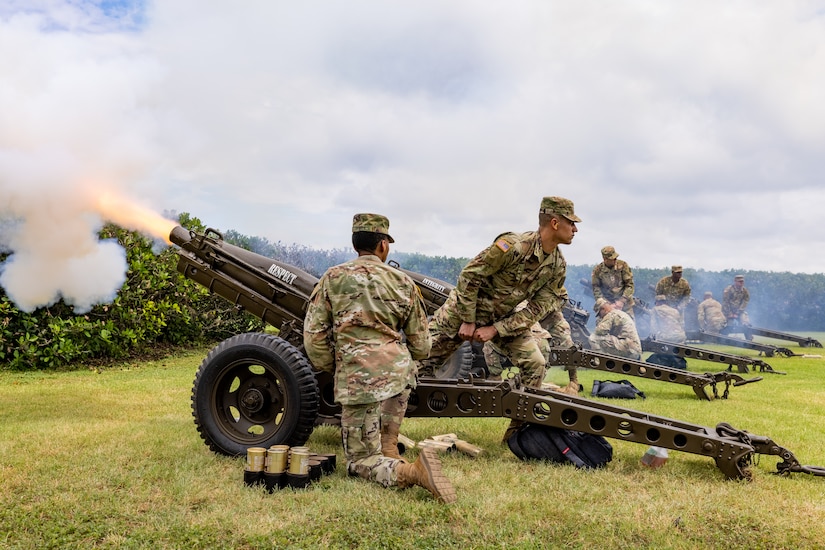 Fort Sam Houston Army Soldiers fire cannons during a Salute to the Nation ceremony, at the Joint Base San Antonio Main Flag Pole at MacArthur Parade Field at JBSA-Fort Sam Houston, Texas, July 4, 2021. The Soldiers fired 50 rounds as a salute to each of the 50 United States.