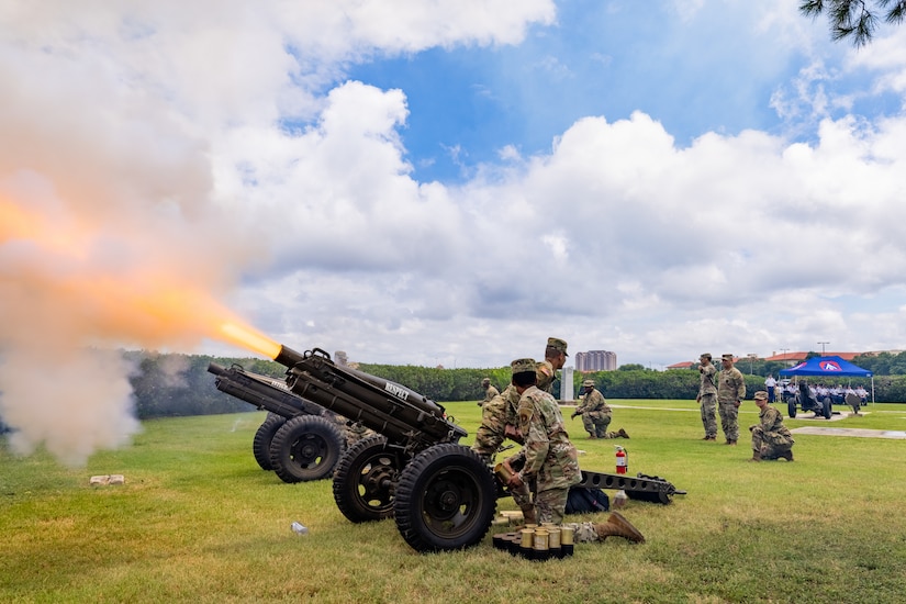 Fort Sam Houston Army Soldiers fire cannons during a Salute to the Nation ceremony, at the Joint Base San Antonio Main Flag Pole at MacArthur Parade Field at JBSA-Fort Sam Houston, Texas, July 4, 2021. The Soldiers fired 50 rounds as a salute to each of the 50 United States.