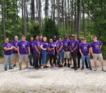 Crystal Taylor (center with hat) stands with volunteers at the 2019 Regional SeaPerch competition held in Jacksonville, Fla.  Volunteers from SERMC supported four SeaPerch teams that went on to compete and place in the 2017 through 2021 SeaPerch National Challenge.