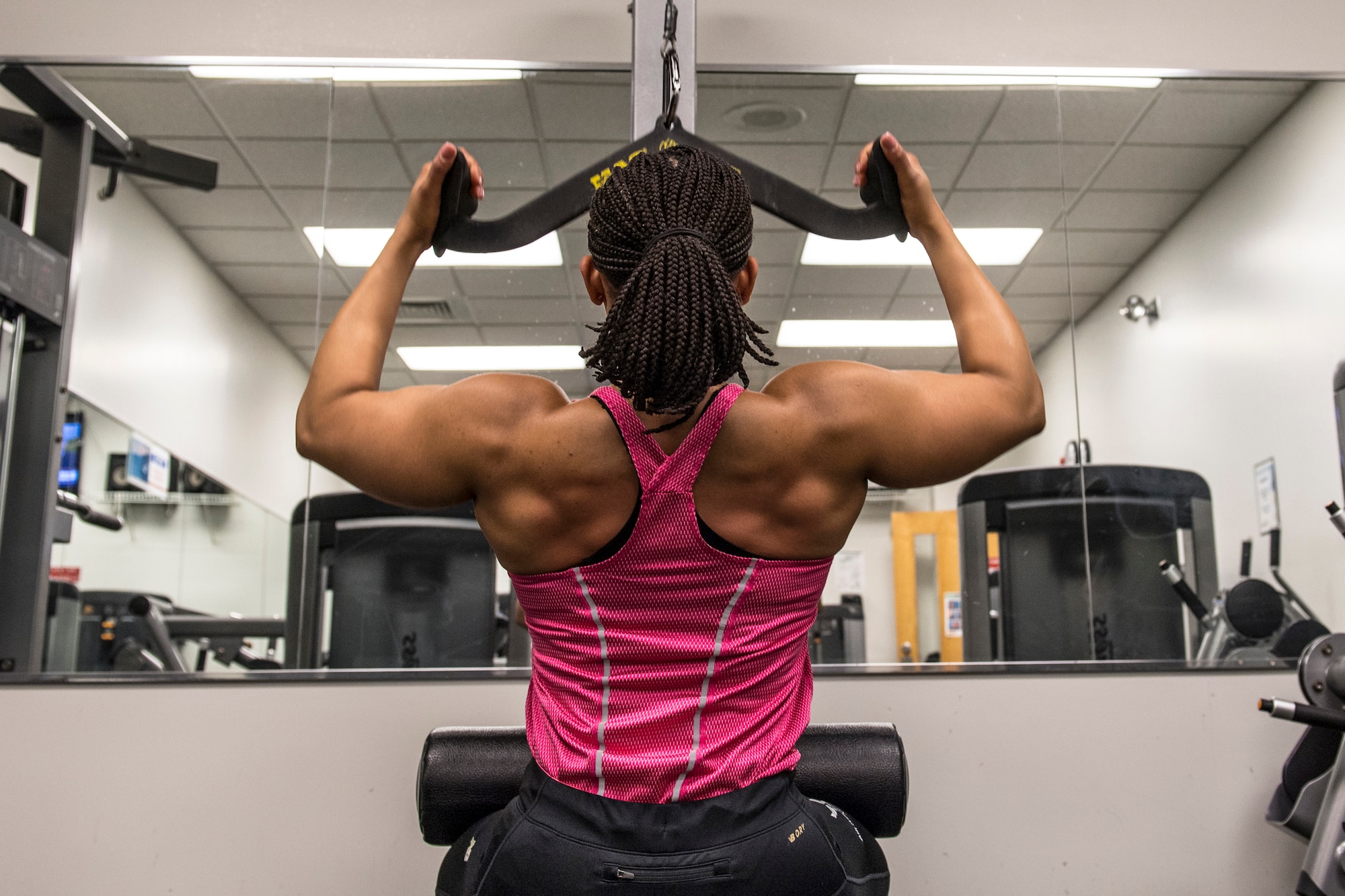 Capt. Danielle L. Daley, operations officer with the 911th Force Support Squadron, performs a lat pulldown exercise at the gym on Pittsburgh International Airport Air Reserve Station, Pennsylvania, May 11, 2021.