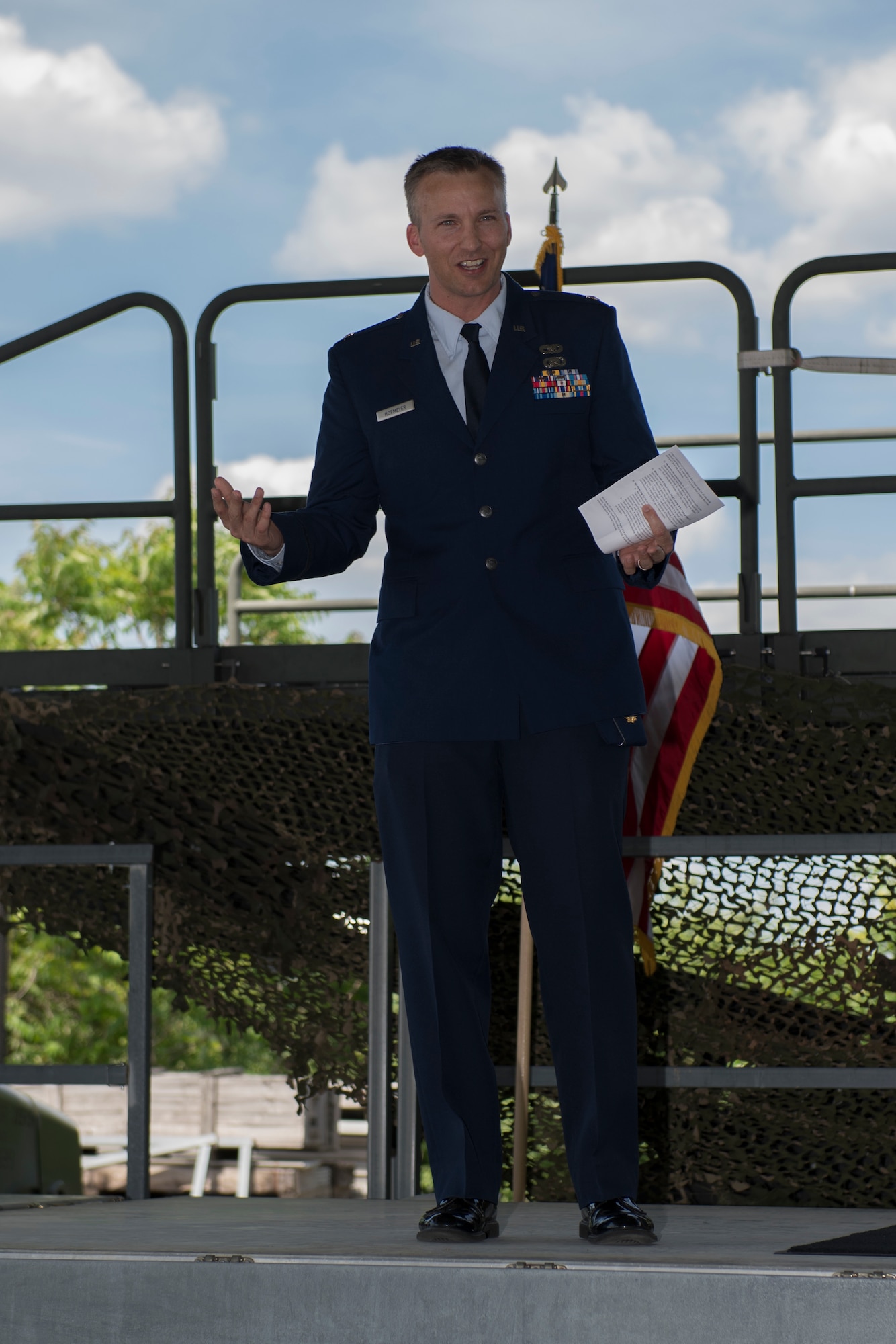 Maj. Erik Hofmeyer, commander of the 32nd Aerial Port Squadron, gives a speech during the promotion ceremony of Chief Master Sgt. Michael C. Heim, 32nd APS squadron superintendent, at the Pittsburgh International Airport Air Reserve Station, Pennsylvania, June 5, 2021.