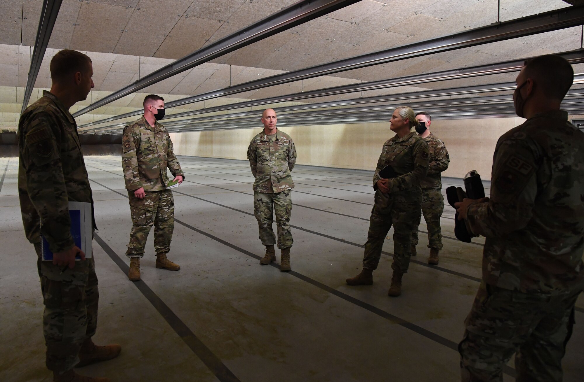 U.S. Air Force Col. William Hunter, 81st Training Wing commander, tours the 81st Security Forces Squadron indoor firing range during an 81st Mission Support Group immersion tour at Keesler Air Force Base, Mississippi, June 24, 2021. The purpose of the tour was to become more familiar with Keesler's mission. (U.S. Air Force photo by Kemberly Groue)