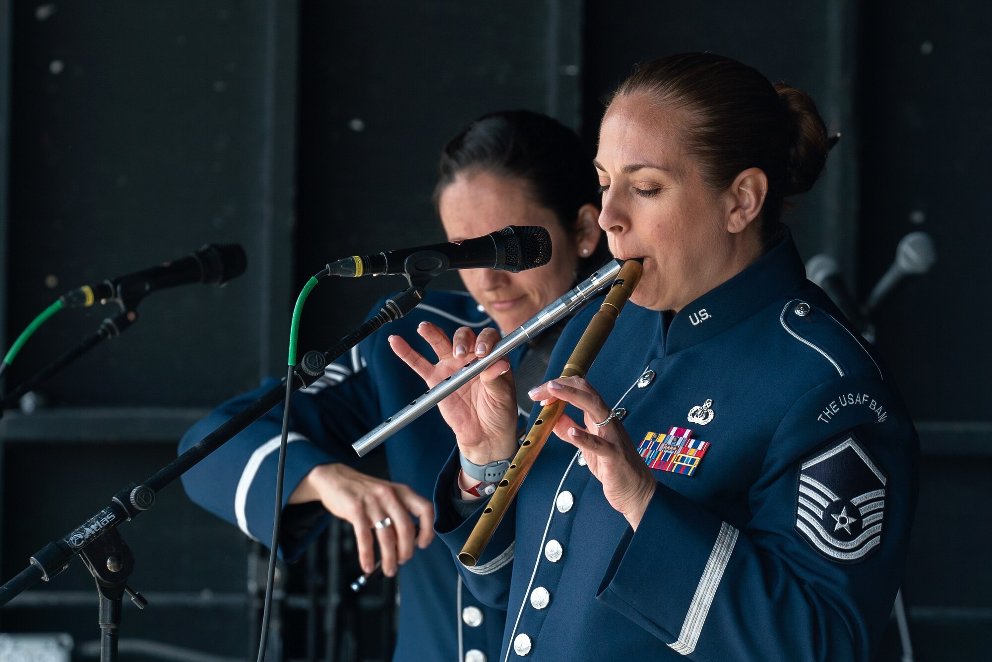 U.S. Air Force Master Sgt. Julia Cuevas, U.S. Air Force Band ensemble Celtic Aire traditional Irish instrumentalist and vocalist, performs at the Alaska Scottish Highland Games in Palmer, Alaska, June 26, 2021.