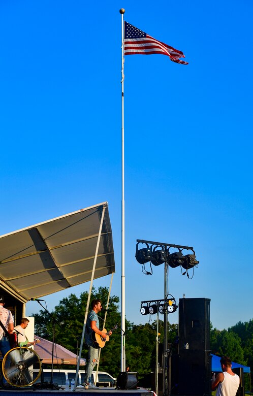 Adam Doleac performs for Airmen and families