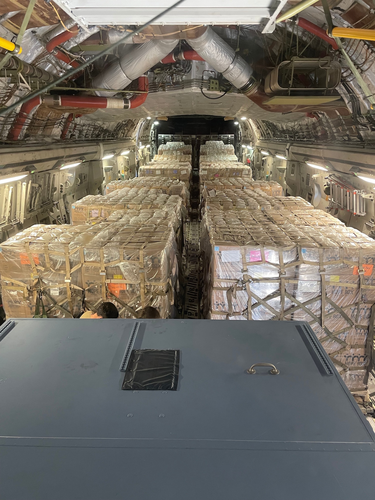 A partially loaded C-17 Globemaster III flown by 446th Airlift Wing aircrew headed for Port au Prince, Haiti, June 14, 2021.