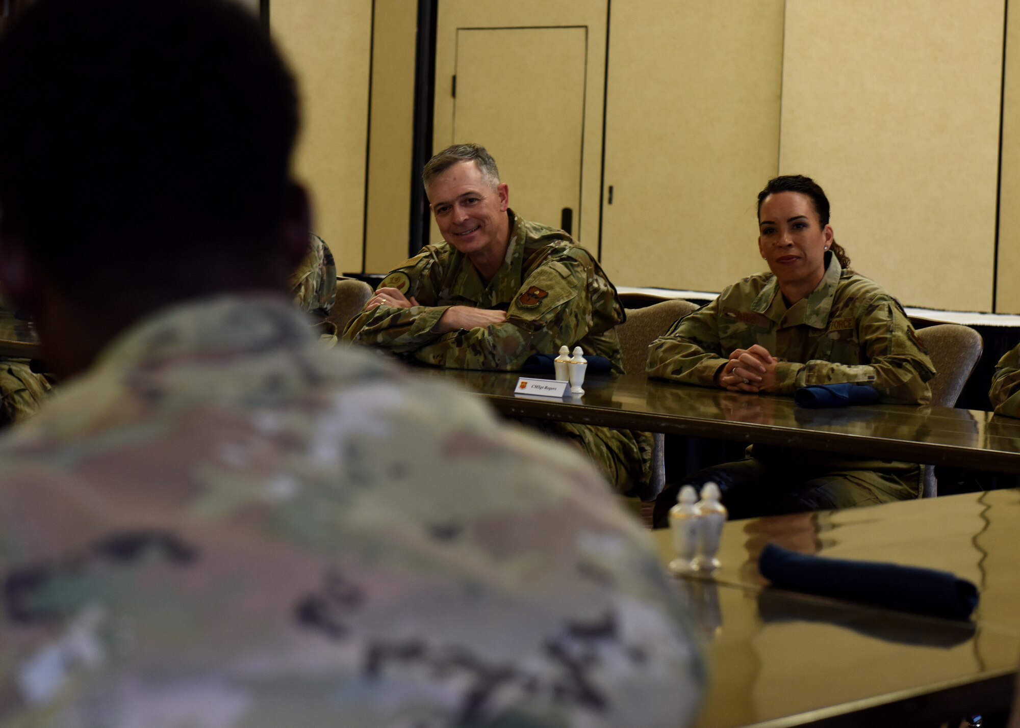 U.S. Air Force Maj. Gen. Craig Wills, left, 19th Air Force commander, and U.S. Air Force Chief Master Sgt. Kristina Rogers, 19th AF command chief, speak with Airmen assigned to the 56th Fighter Wing during a luncheon, June 28, 2021, at Luke Air Force Base, Arizona. During the luncheon, Airmen discussed with senior leadership various topics such as GI Bill benefits, mental health, and diversity and inclusion within the Air Force. Leadership from the 19th AF visited Luke AFB to engage with the 56th Fighter Wing and gain a better understanding of the successes and challenges faced by the wing. (U.S. Air Force photo by Tech. Sgt. Franklin R. Ramos)