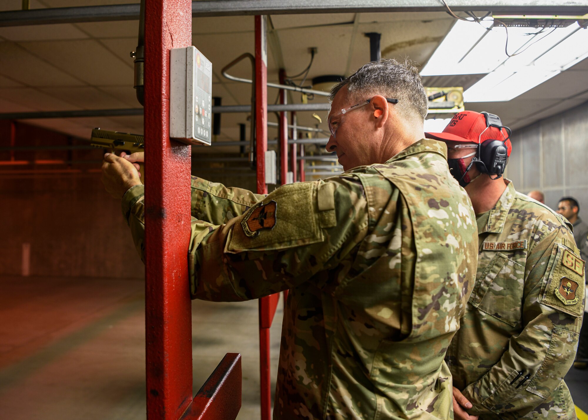 U.S. Air Force Maj. Gen. Craig Wills, 19th Air Force commander, fires an M9 Beretta while visiting the 56th Security Forces Squadron Combat Arms Training and Maintenance facility, June 29, 2021, at Luke Air Force Base, Arizona. Leadership from the 19th AF visited Luke AFB to engage with the 56th Fighter Wing and gain a better understanding of the successes and challenges faced by the wing. The 56th FW’s mission is to train the world’s greatest fighter pilots and combat-ready Airmen. (U.S. Air Force photo by Airman 1st Class David Busby)